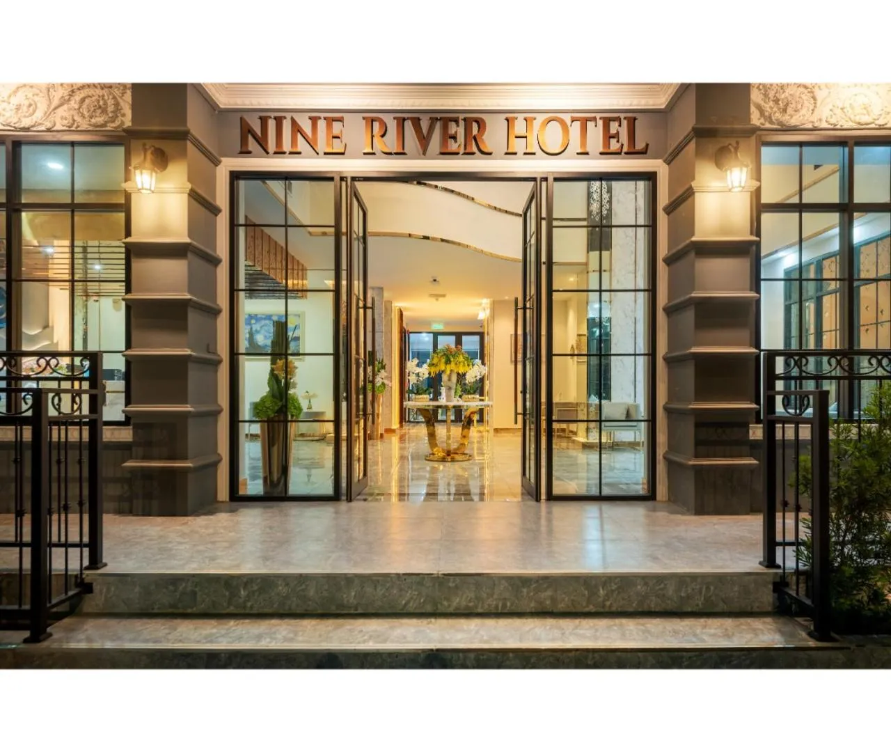 Property logo or sign in Nine River Hotel