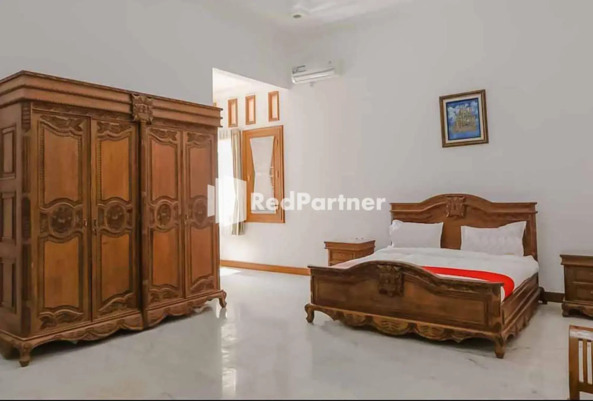 Bed in RedDoorz at Daffi Araya Bed in RedDoorz at Daffi Araya