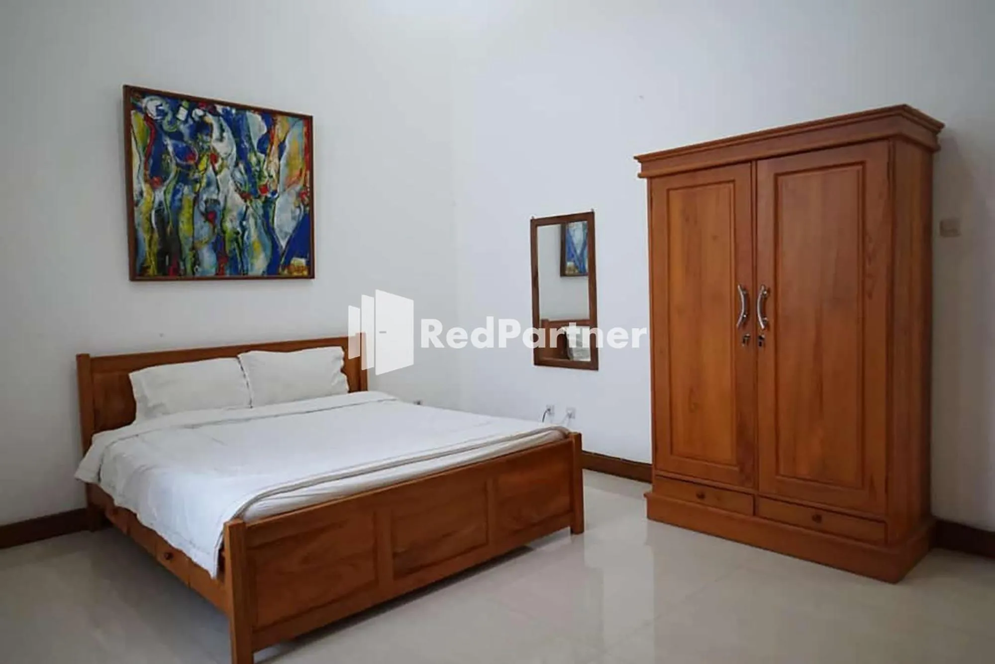 Bed in RedDoorz at Daffi Araya