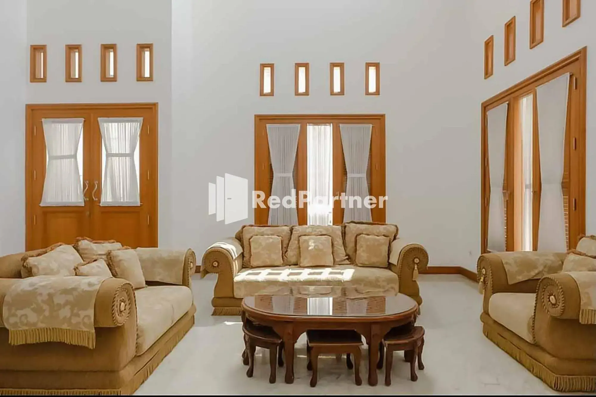 Living room in RedDoorz at Daffi Araya Living room in RedDoorz at Daffi Araya