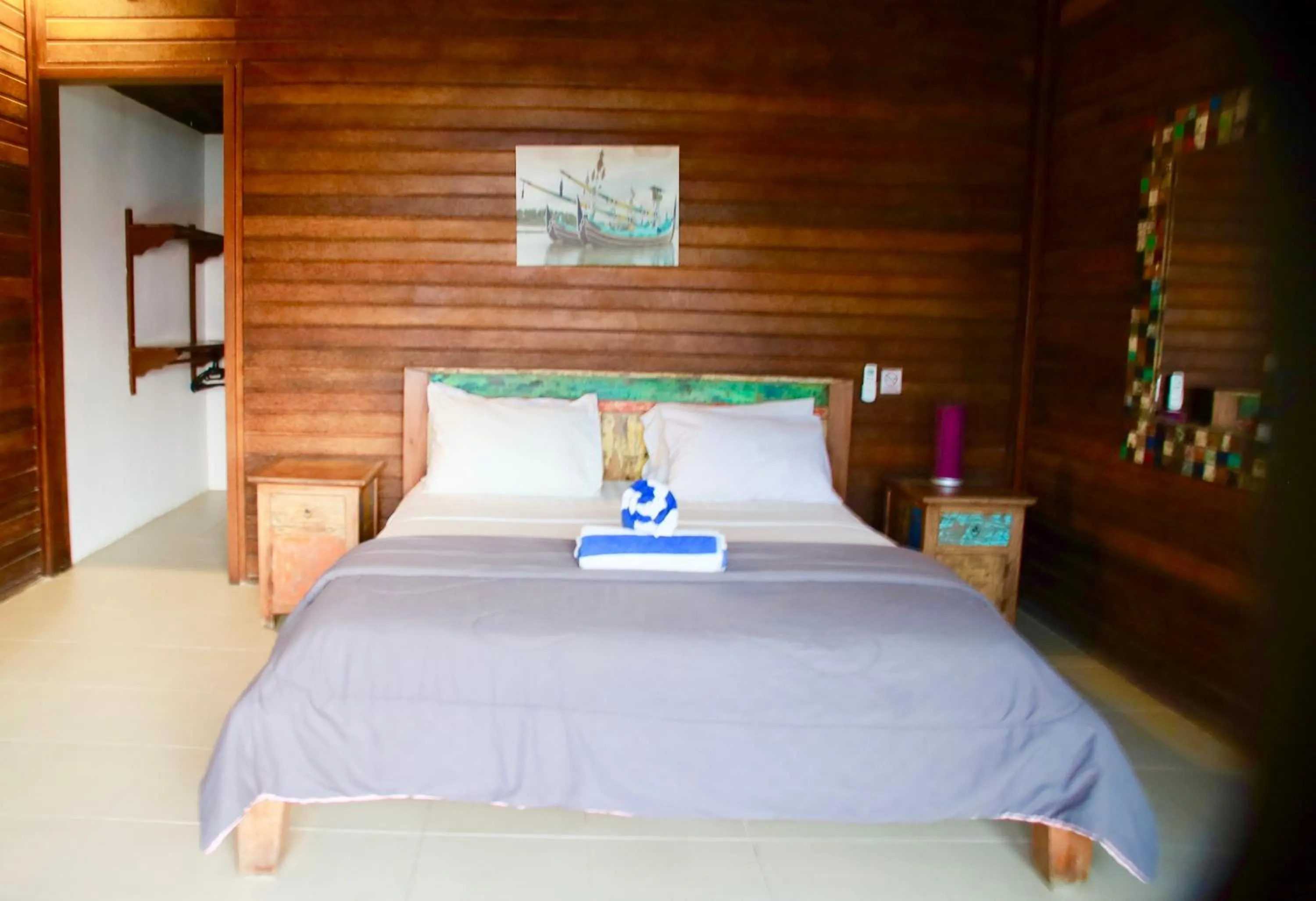 Bed in The Palms Ceningan Hotel