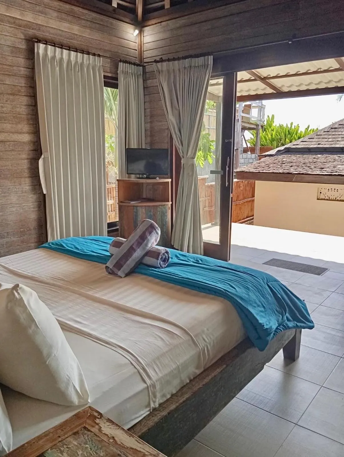 View (from property/room), Bed in The Palms Ceningan Hotel