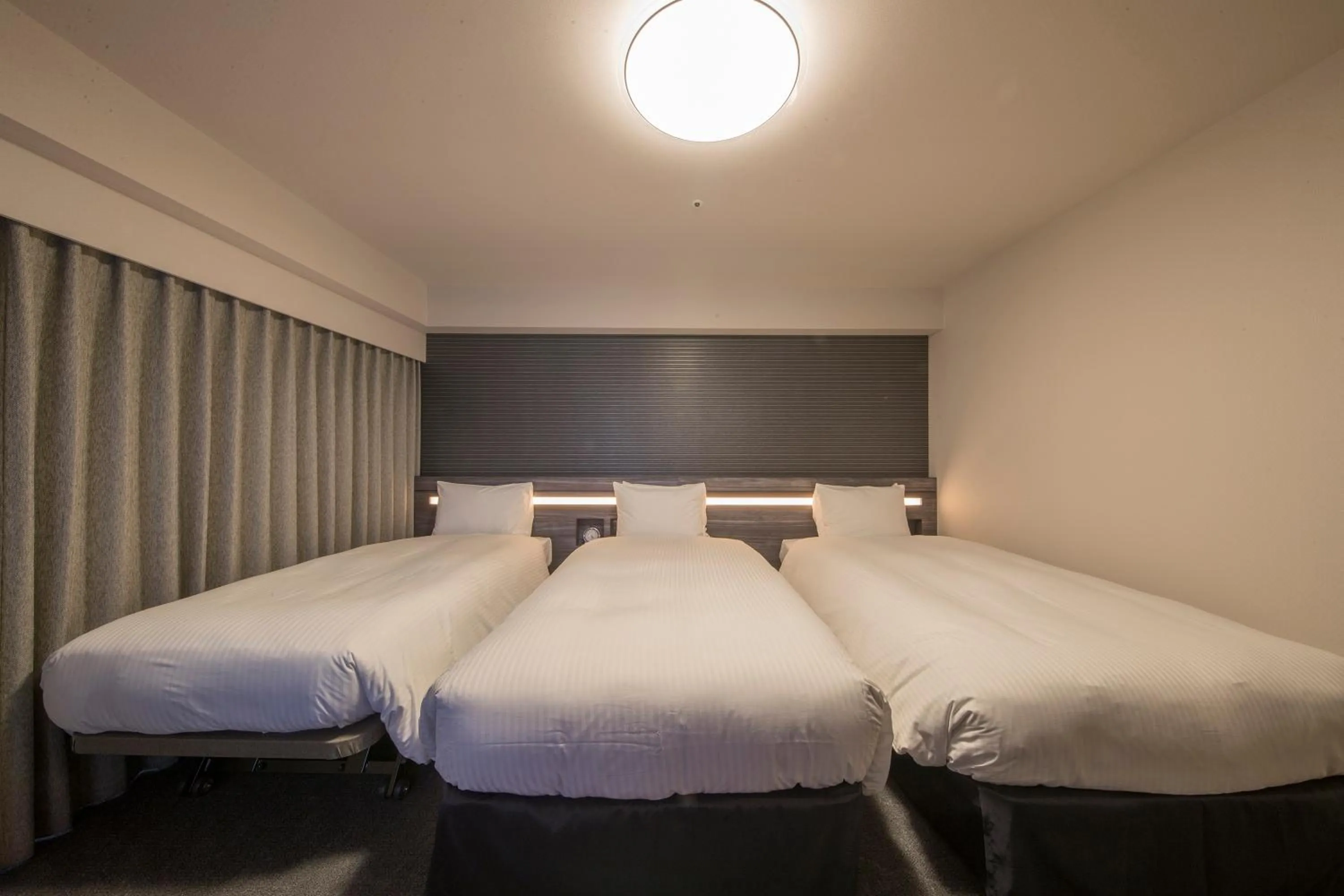 Bed in Richmond Hotel Kumamoto Shinshigai