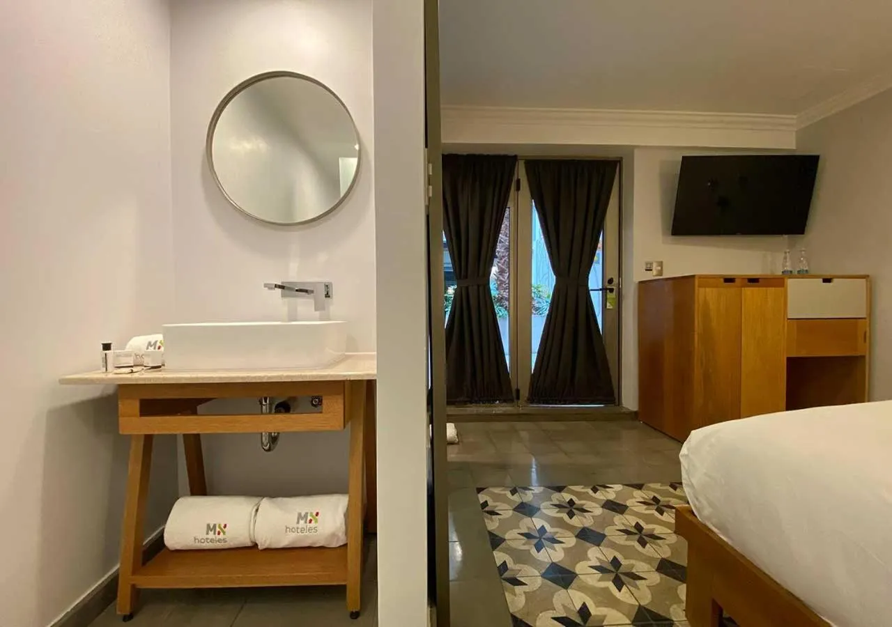 Toilet, Bed in Hotel MX condesa CDMX, Trademark Collection by Wyndham