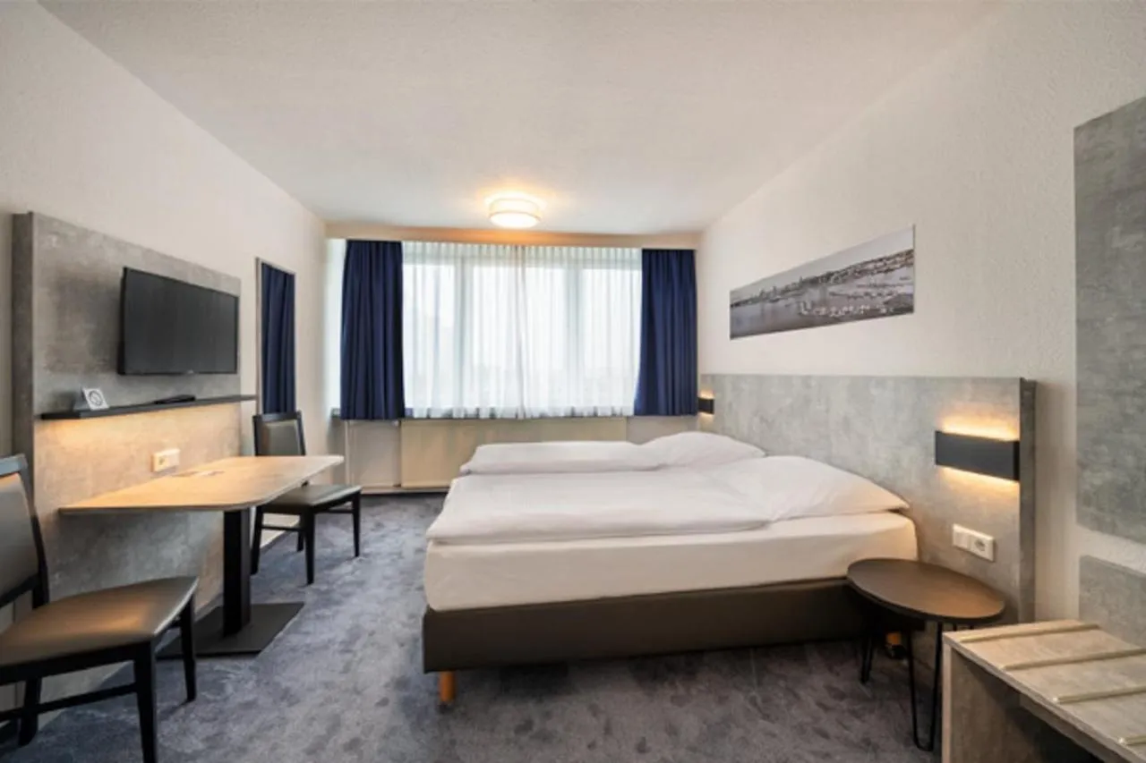 Living room, Bed in Hotel & Gästehaus Rostock Lütten Klein