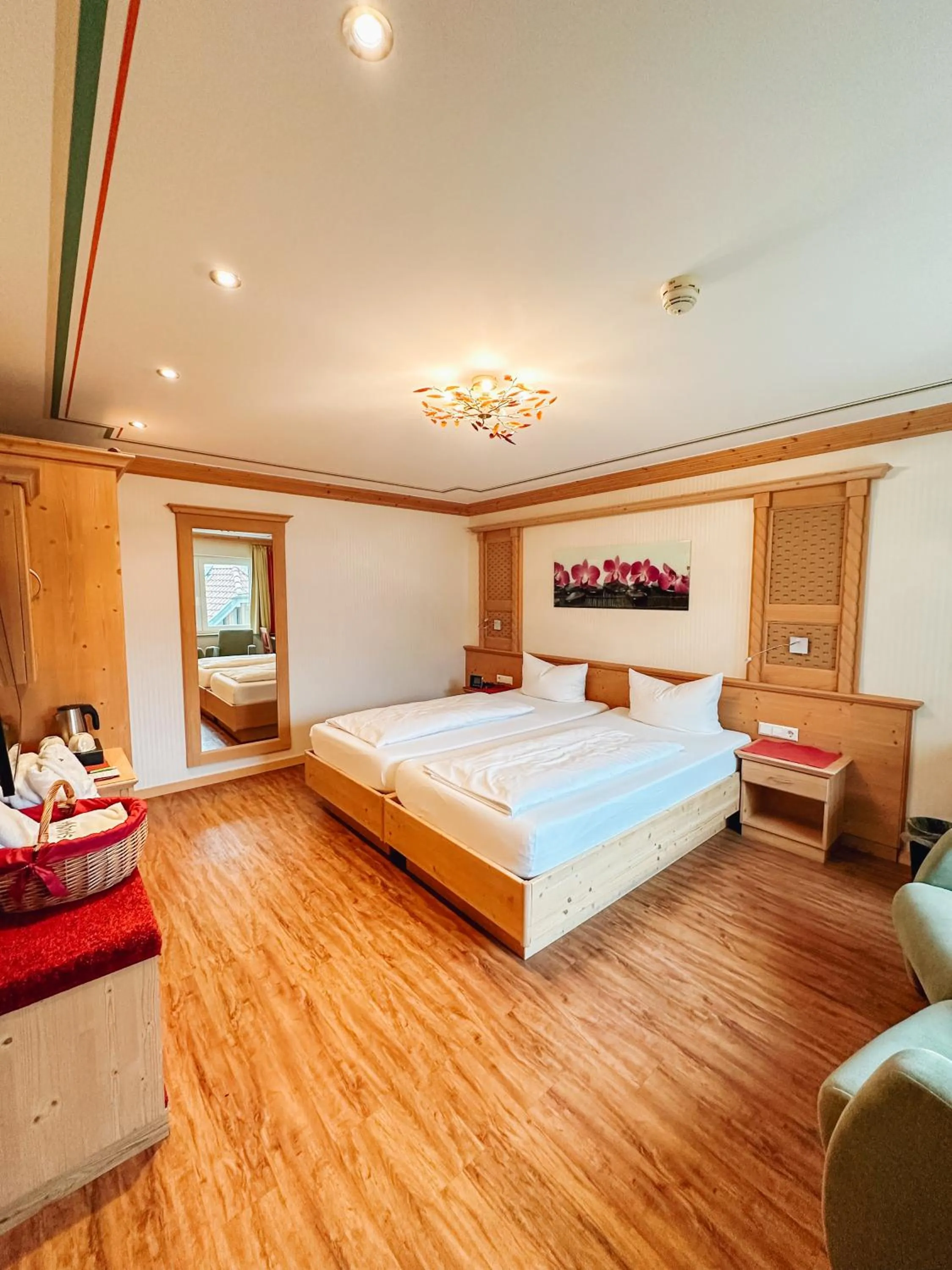 Photo of the whole room, Bed in Hotel Schwarzwald-Resort Rößle