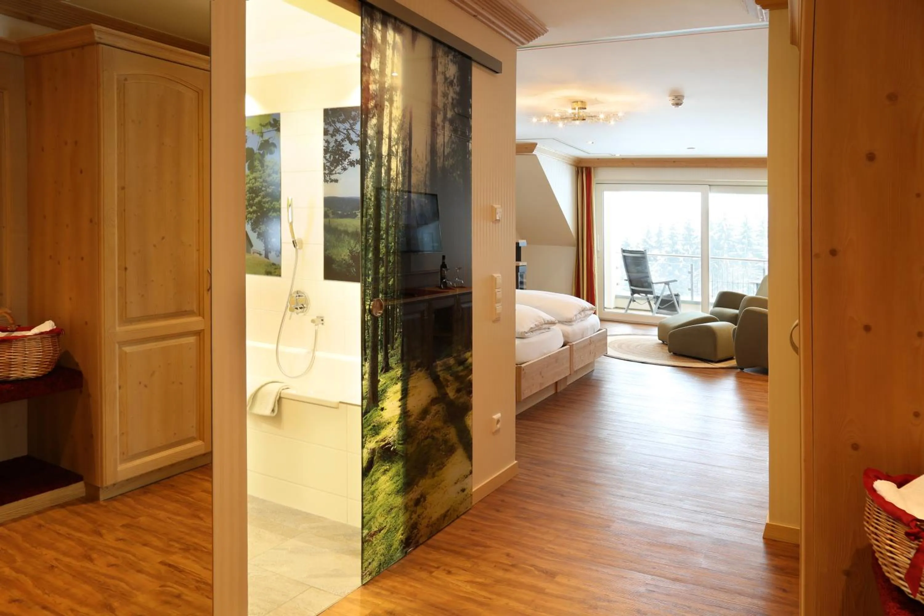 Photo of the whole room, Bed in Hotel Schwarzwald-Resort Rößle