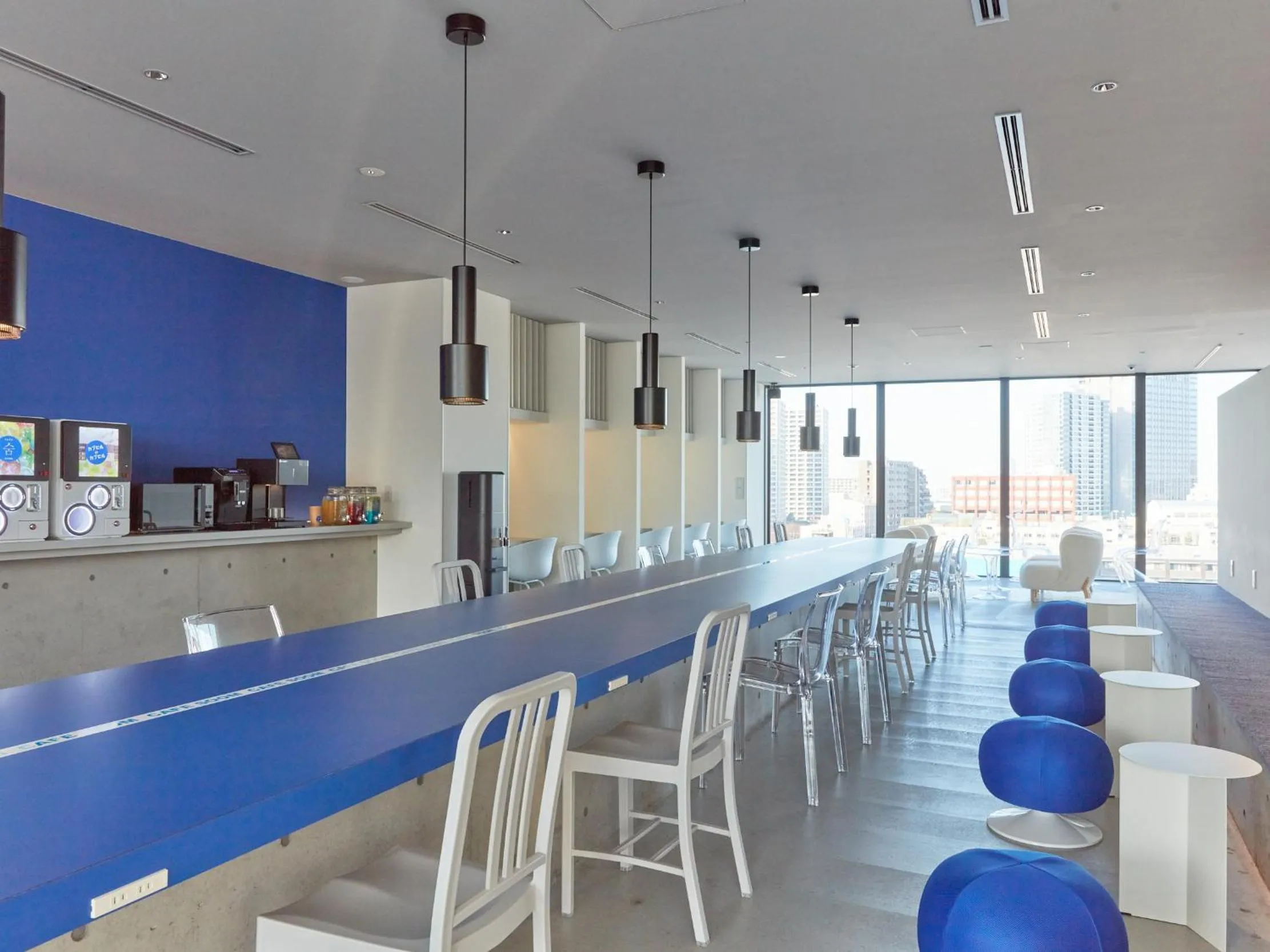 Communal lounge/ TV room in Rembrandt Cabin Shinjuku Shin-Okubo