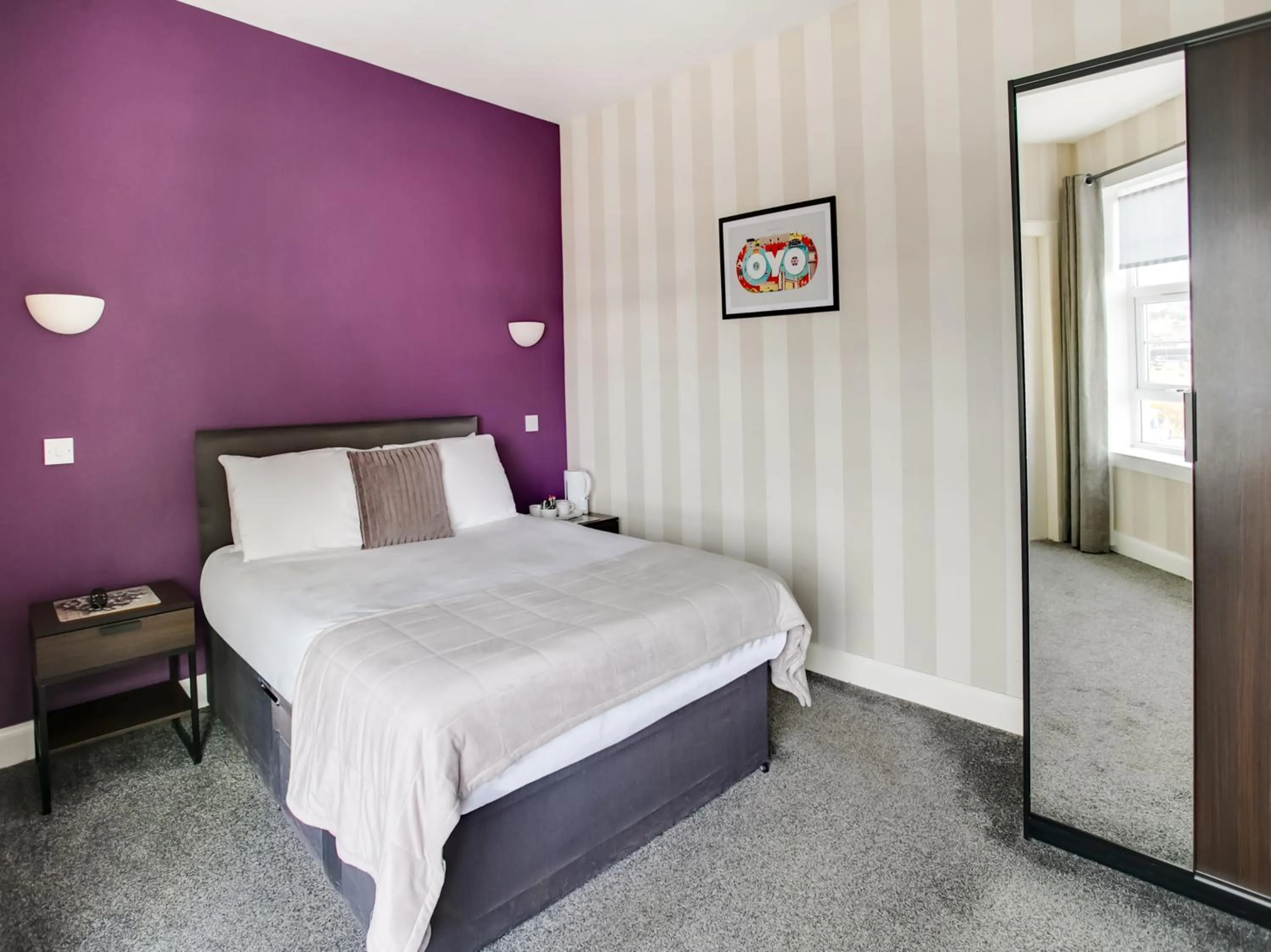 Bedroom, Bed in OYO Gin House Hotel