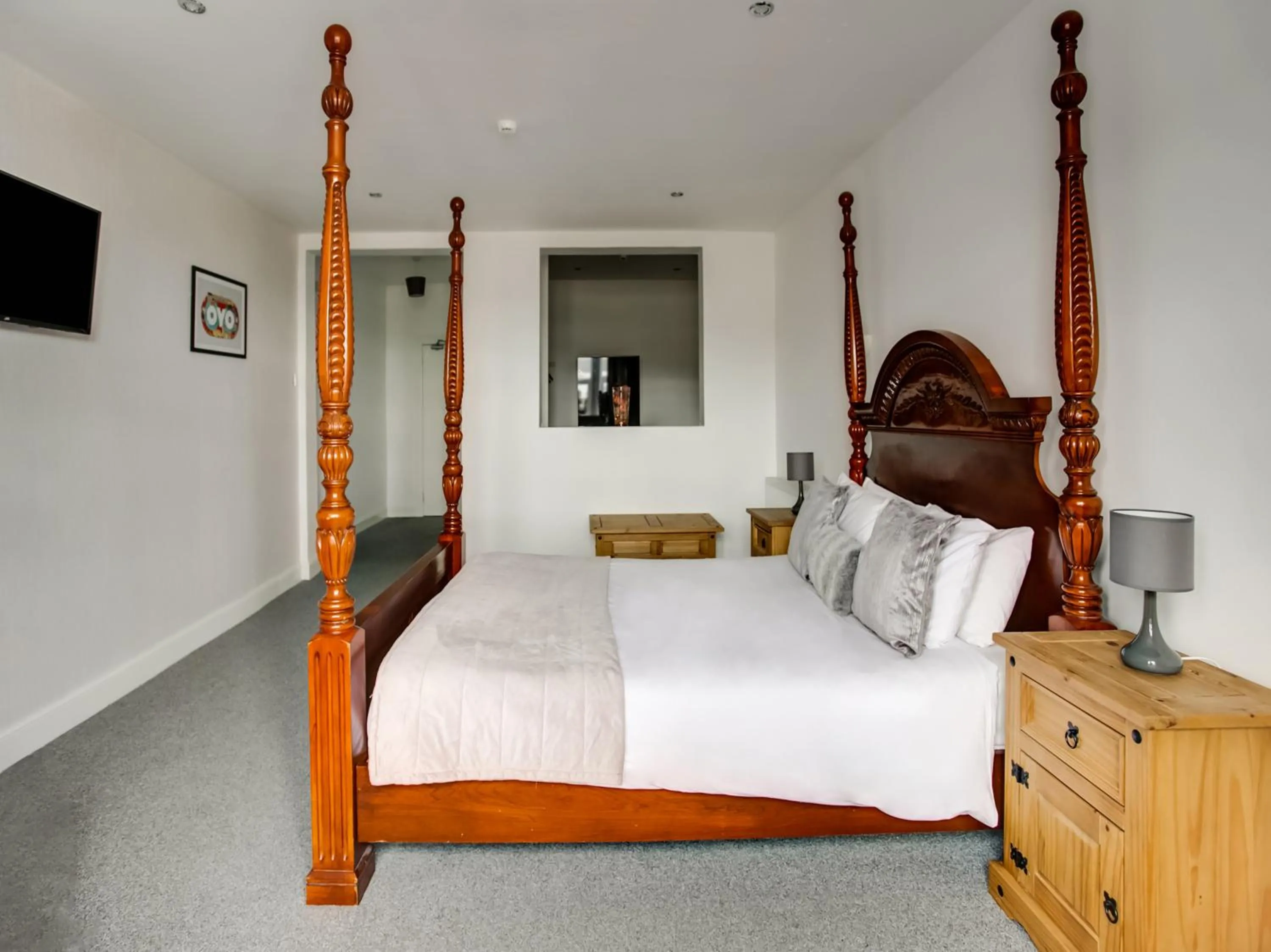 Photo of the whole room, Bed in OYO Gin House Hotel