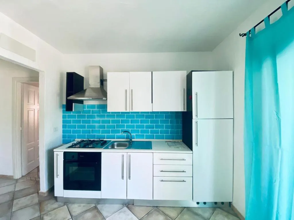 Kitchen or kitchenette in Residenze Il Girasole