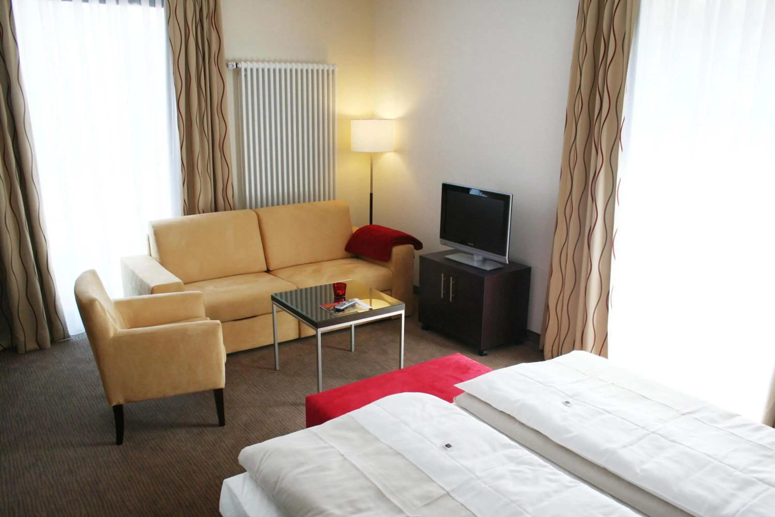 Seating area, Bed in Best Western Plus Hotel Ostertor