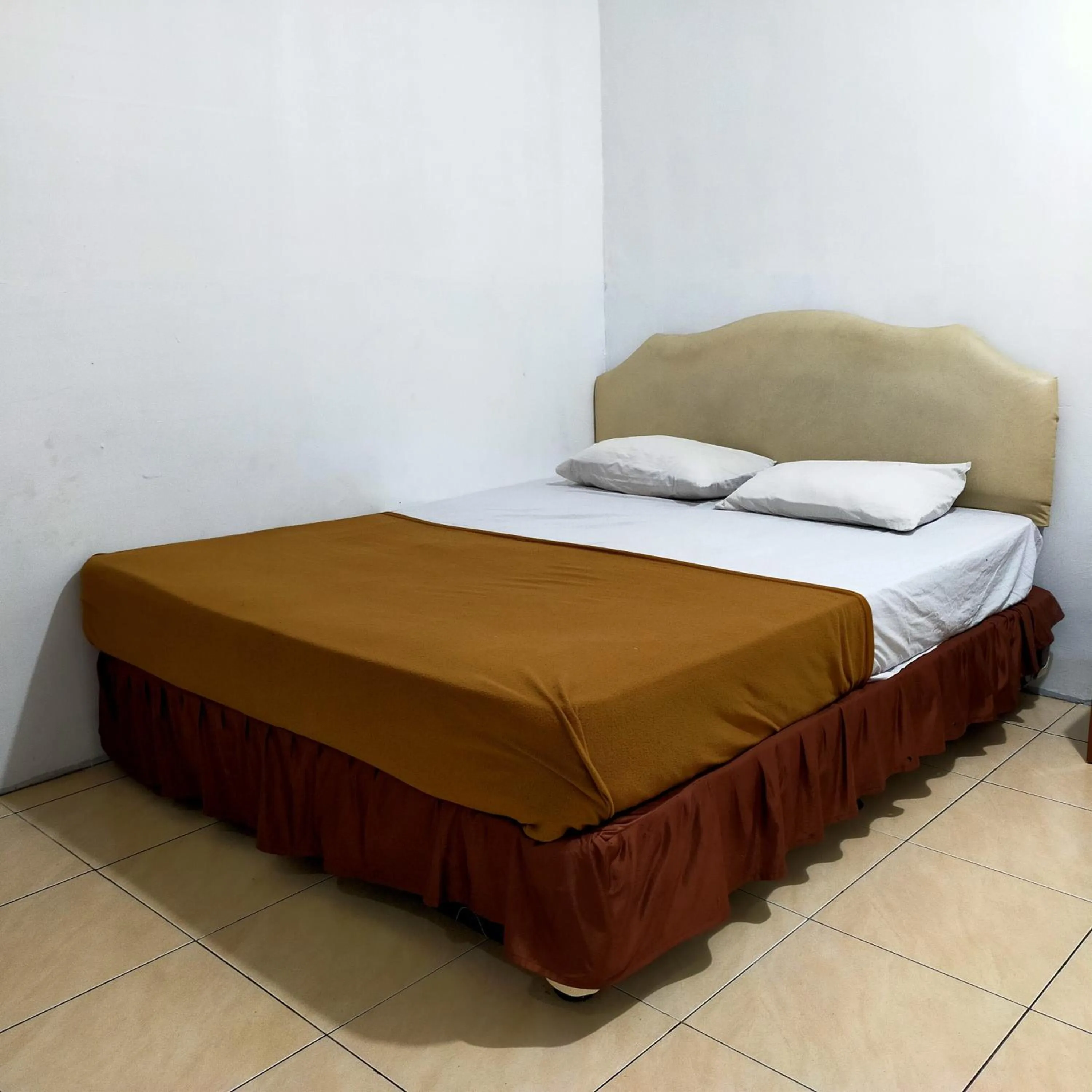 Bed in Hotel Nirwana Ternate RedPartner