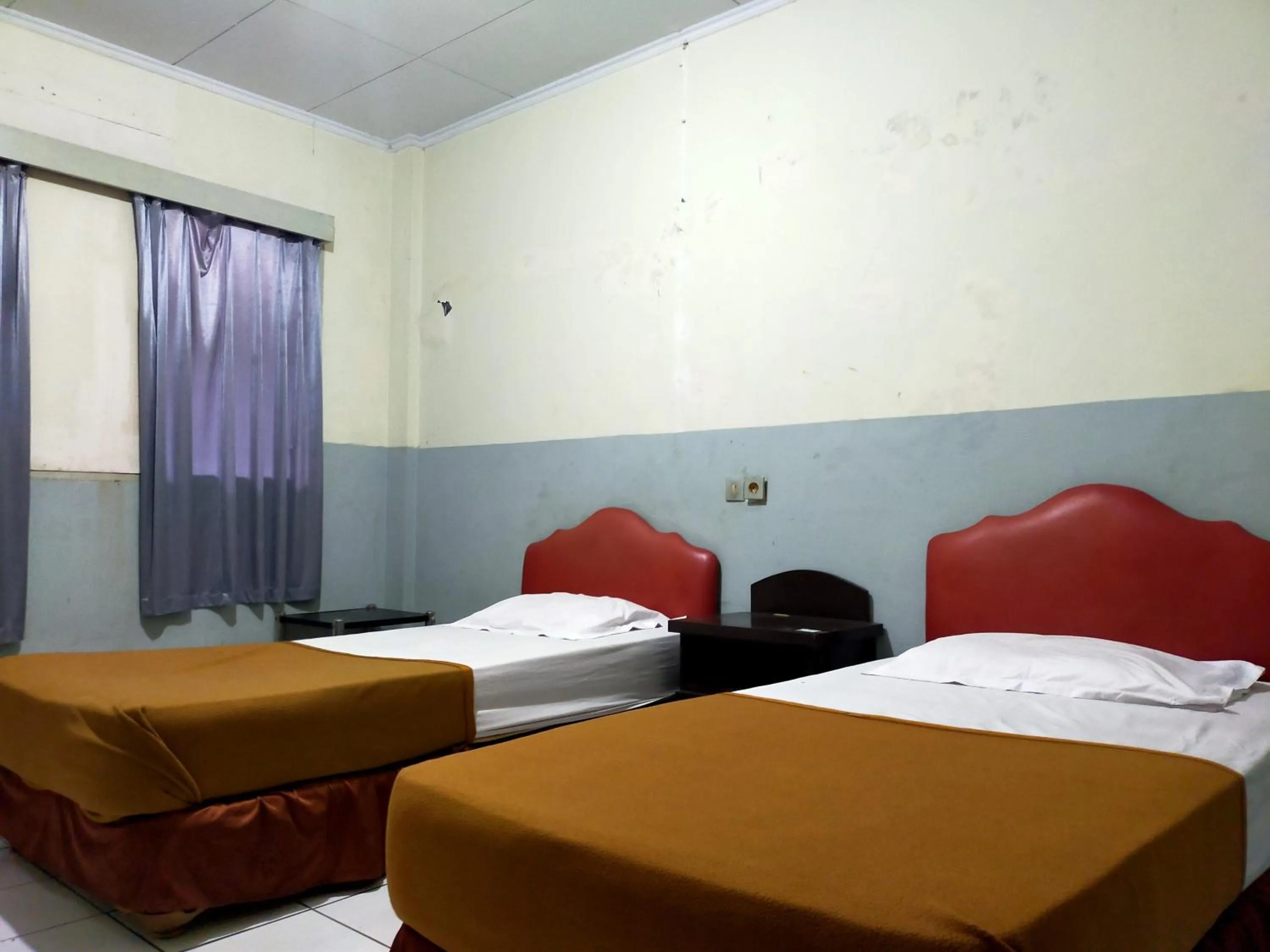 Bed in Hotel Nirwana Ternate RedPartner
