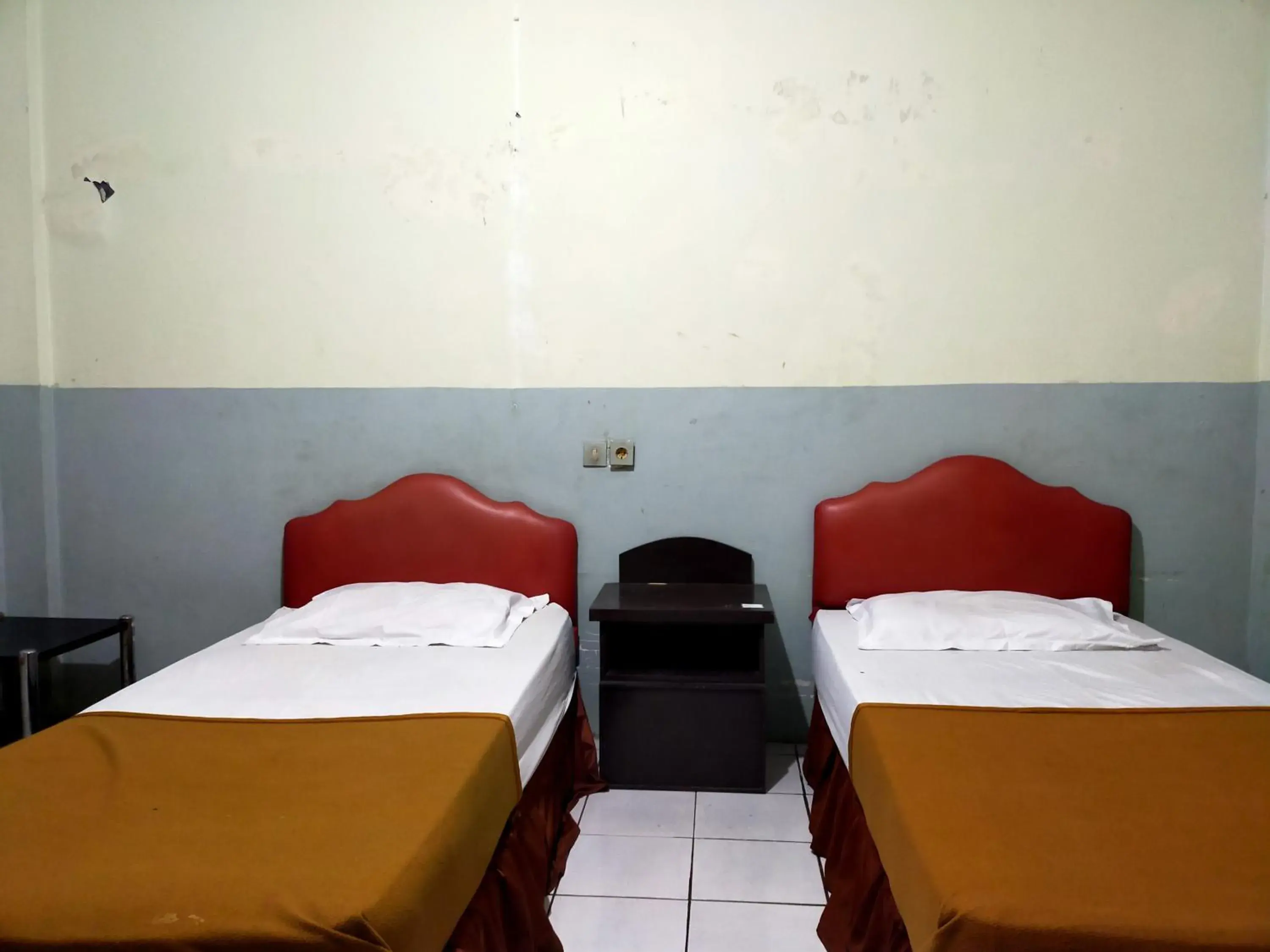 Bed in Hotel Nirwana Ternate RedPartner Bed in Hotel Nirwana Ternate RedPartner