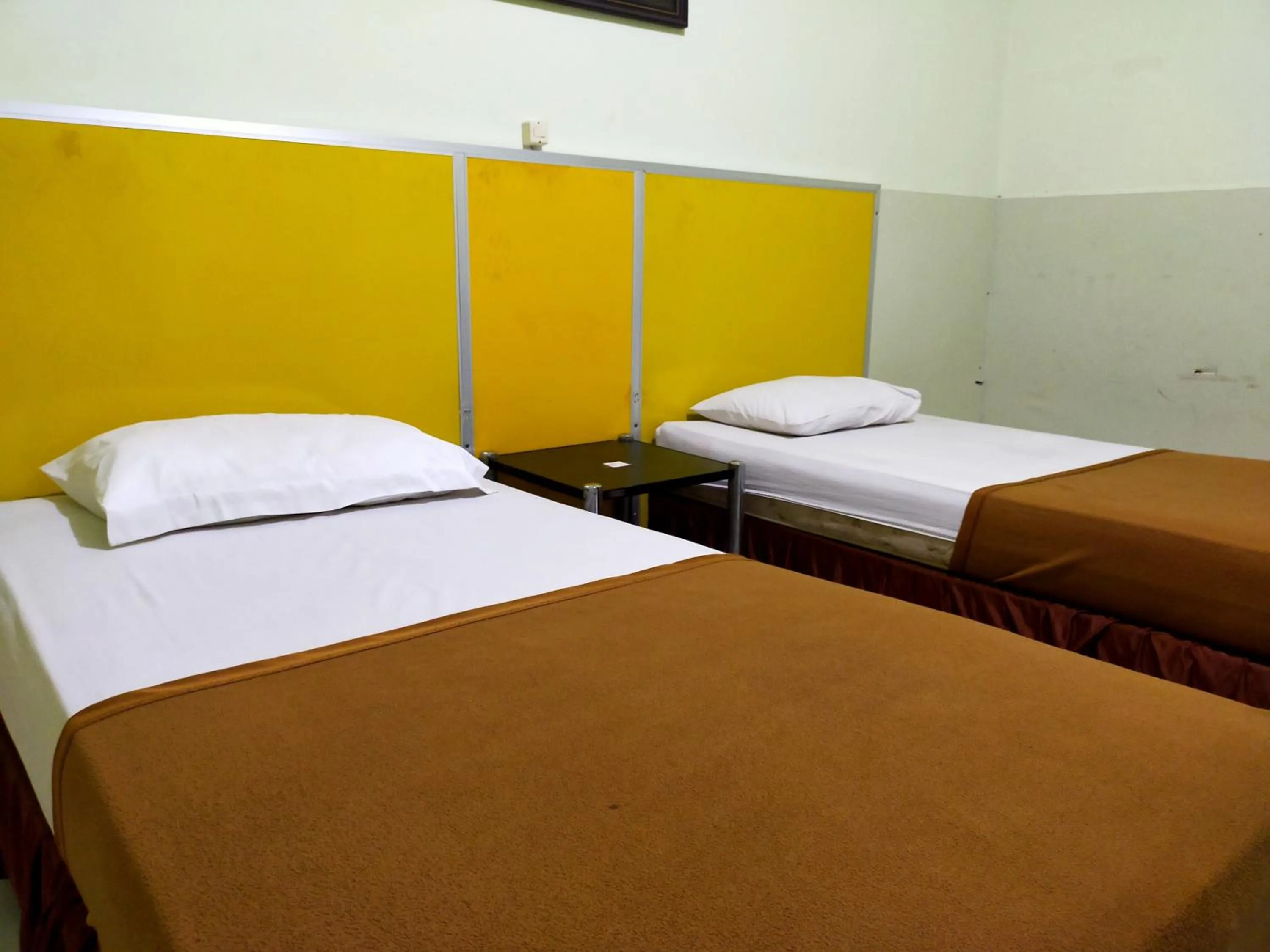 Bed in Hotel Nirwana Ternate RedPartner