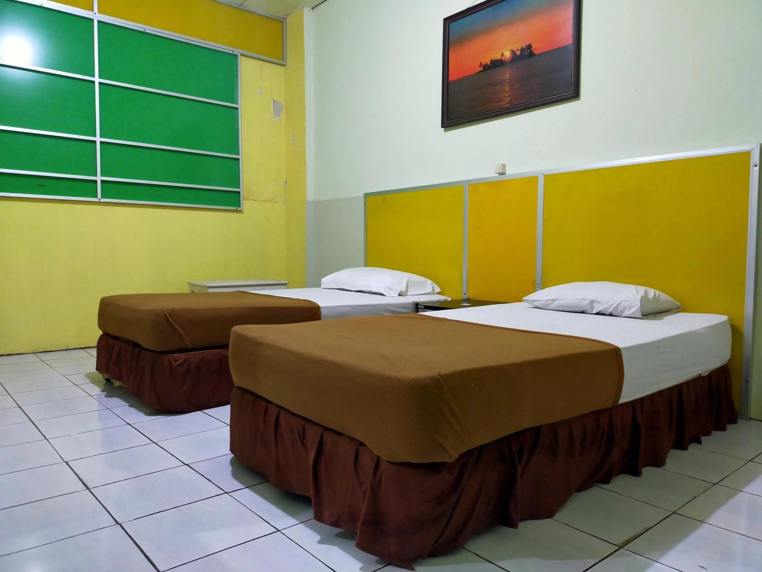 Bed in Hotel Nirwana Ternate RedPartner