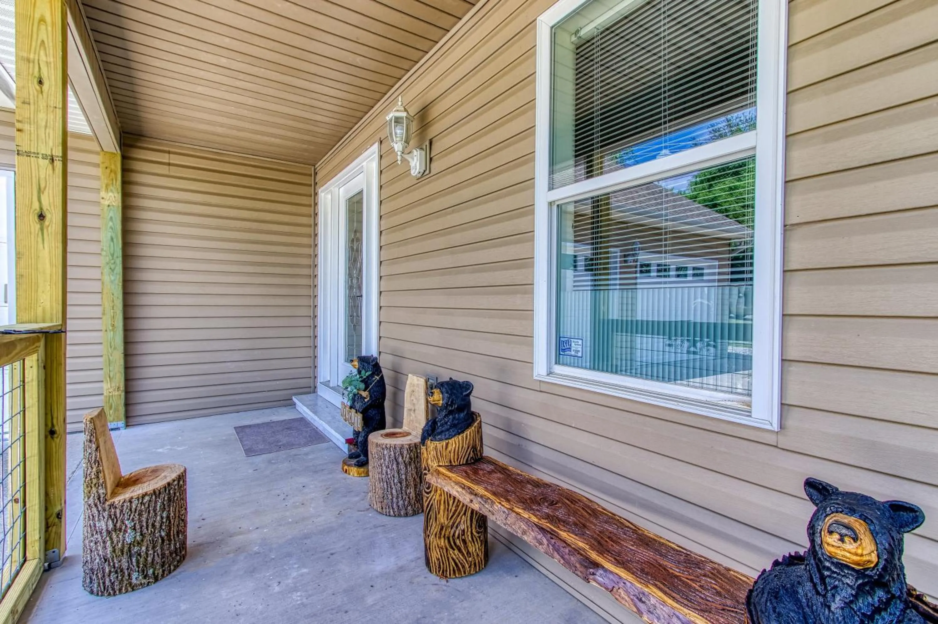 Facade/entrance in Rustic River Lodge by HoneyBearCabins 7BR 6BA sleeps 21