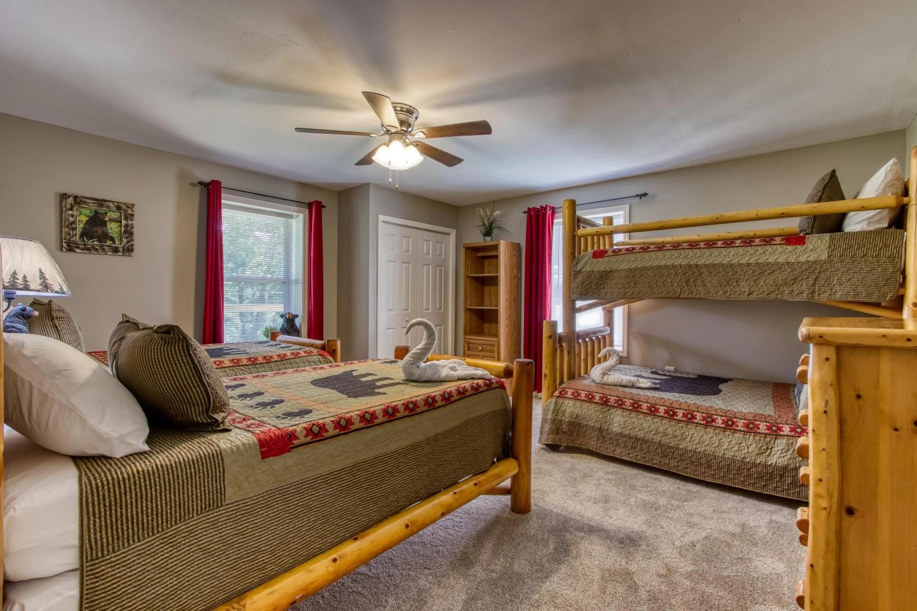 Bed in Rustic River Lodge by HoneyBearCabins 7BR 6BA sleeps 21