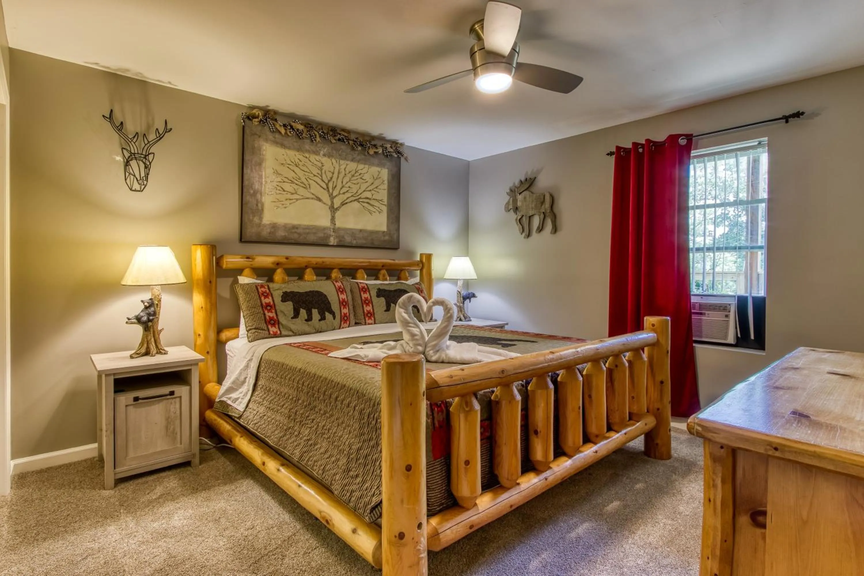 Bed in Rustic River Lodge by HoneyBearCabins 7BR 6BA sleeps 21