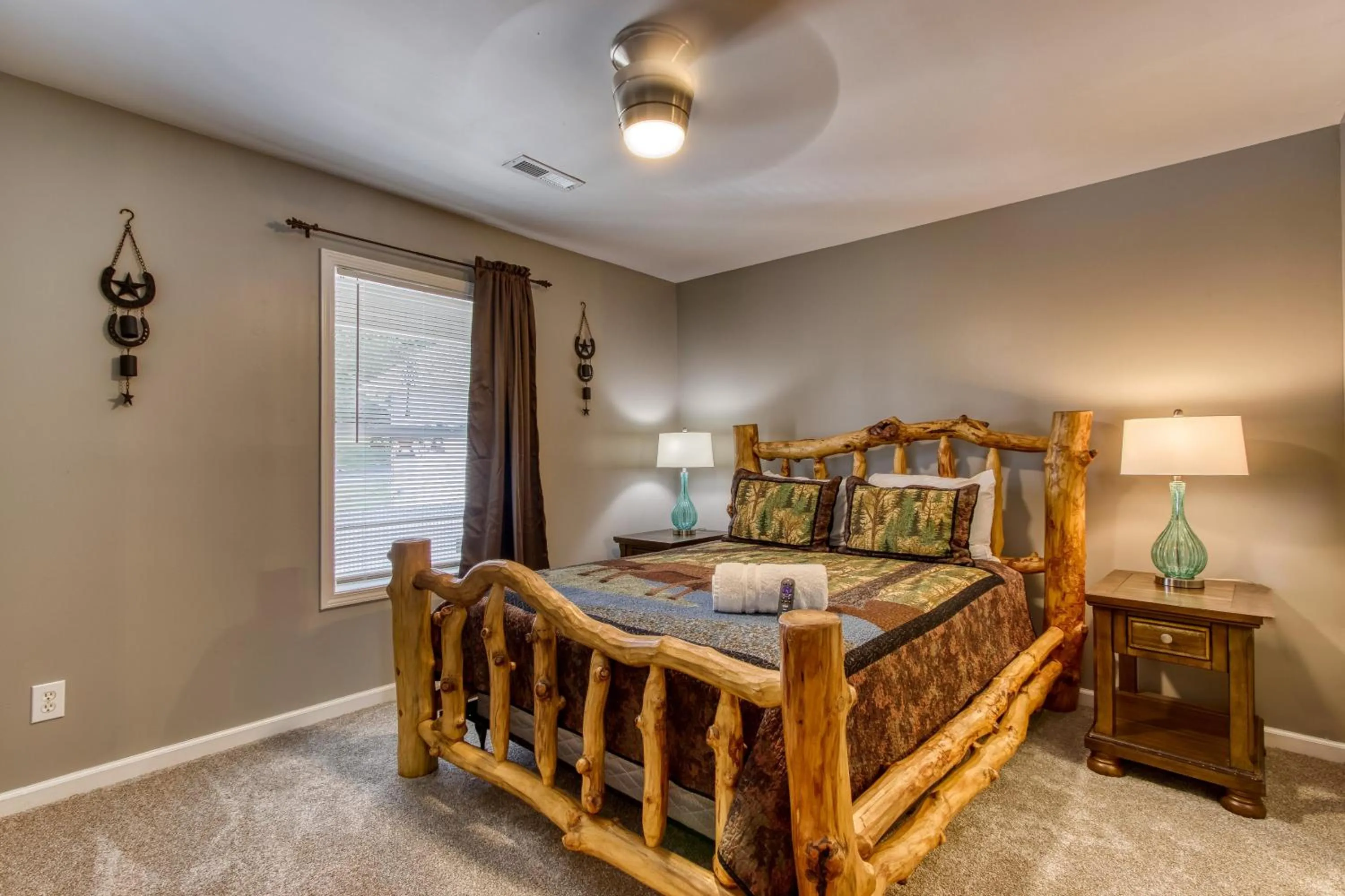 Bed in Rustic River Lodge by HoneyBearCabins 7BR 6BA sleeps 21