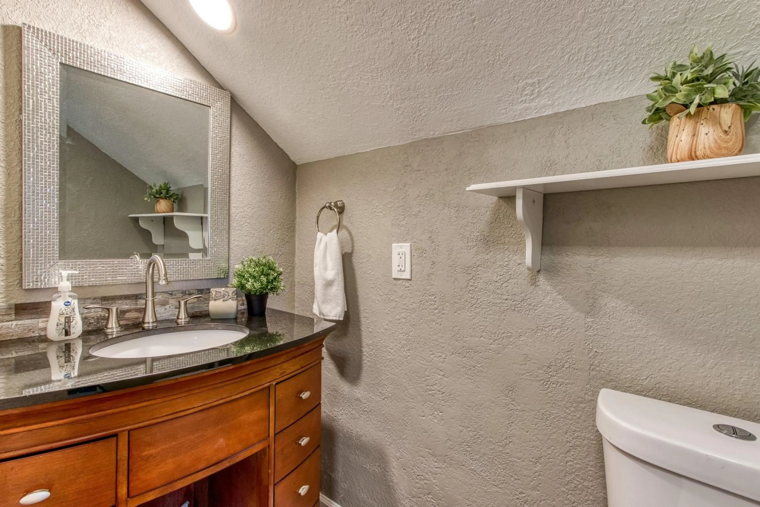 Bathroom in Rustic River Lodge by HoneyBearCabins 7BR 6BA sleeps 21