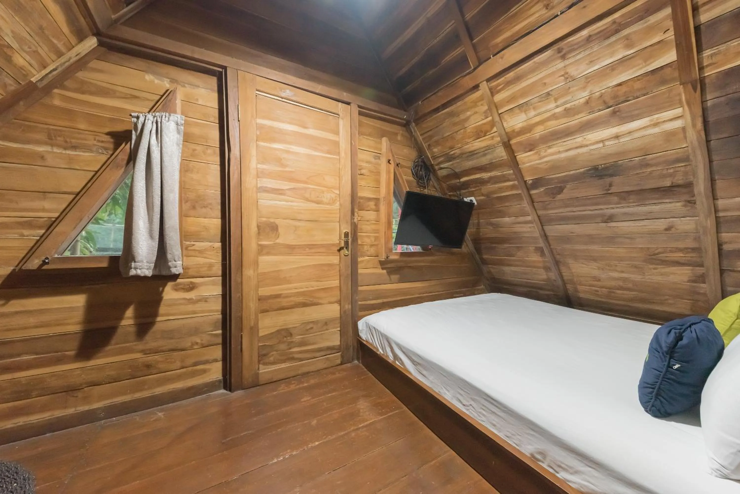 Bed in Urbanview Hotel Cianjur City Park by RedDoorz