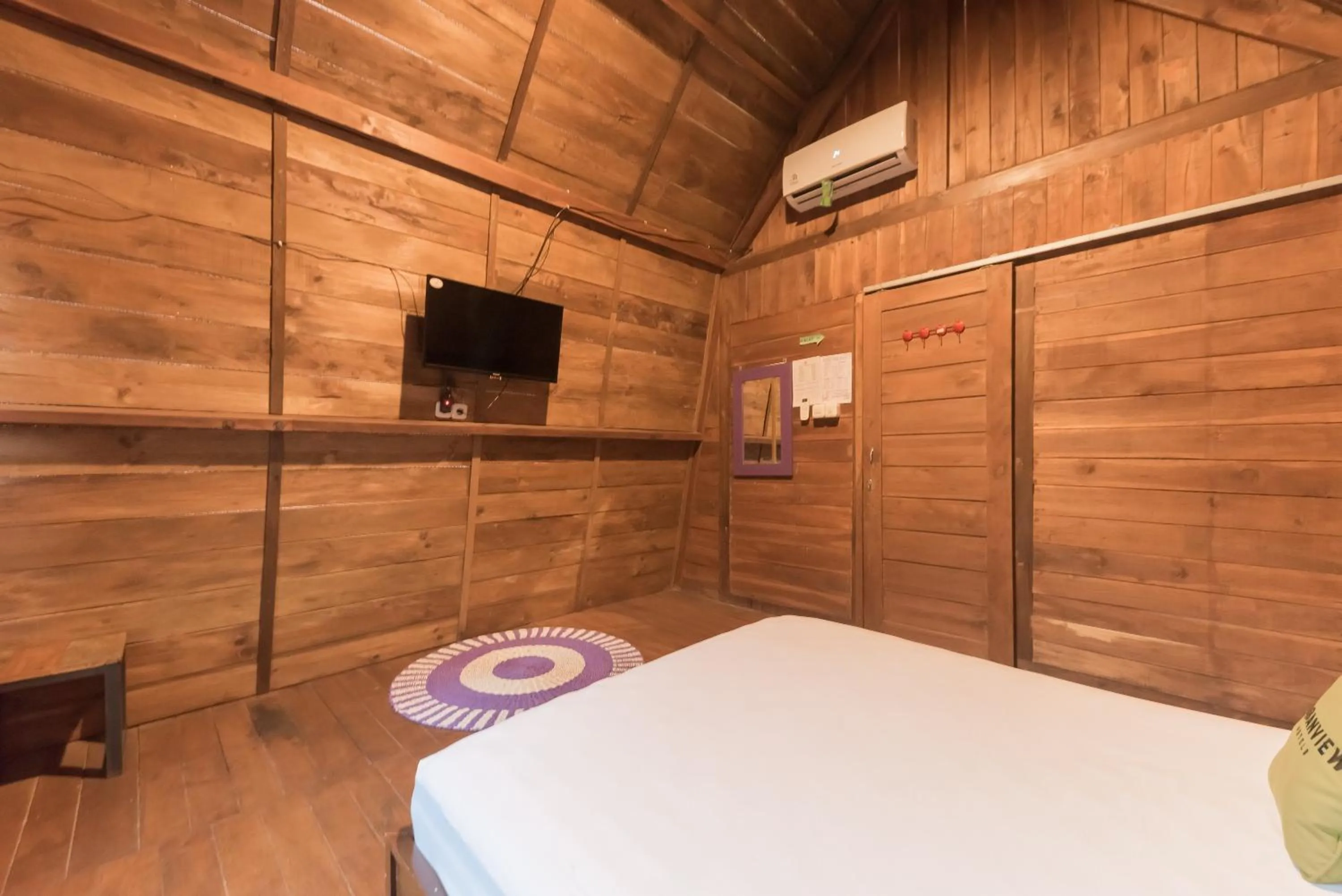 Bed in Urbanview Hotel Cianjur City Park by RedDoorz