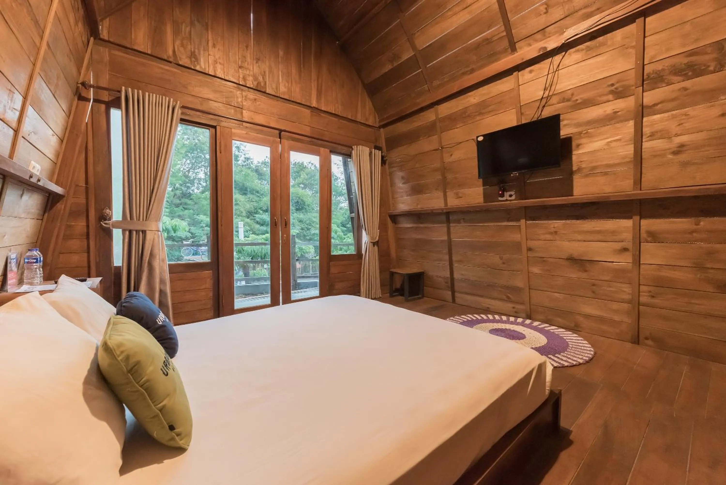 Bed in Urbanview Hotel Cianjur City Park by RedDoorz