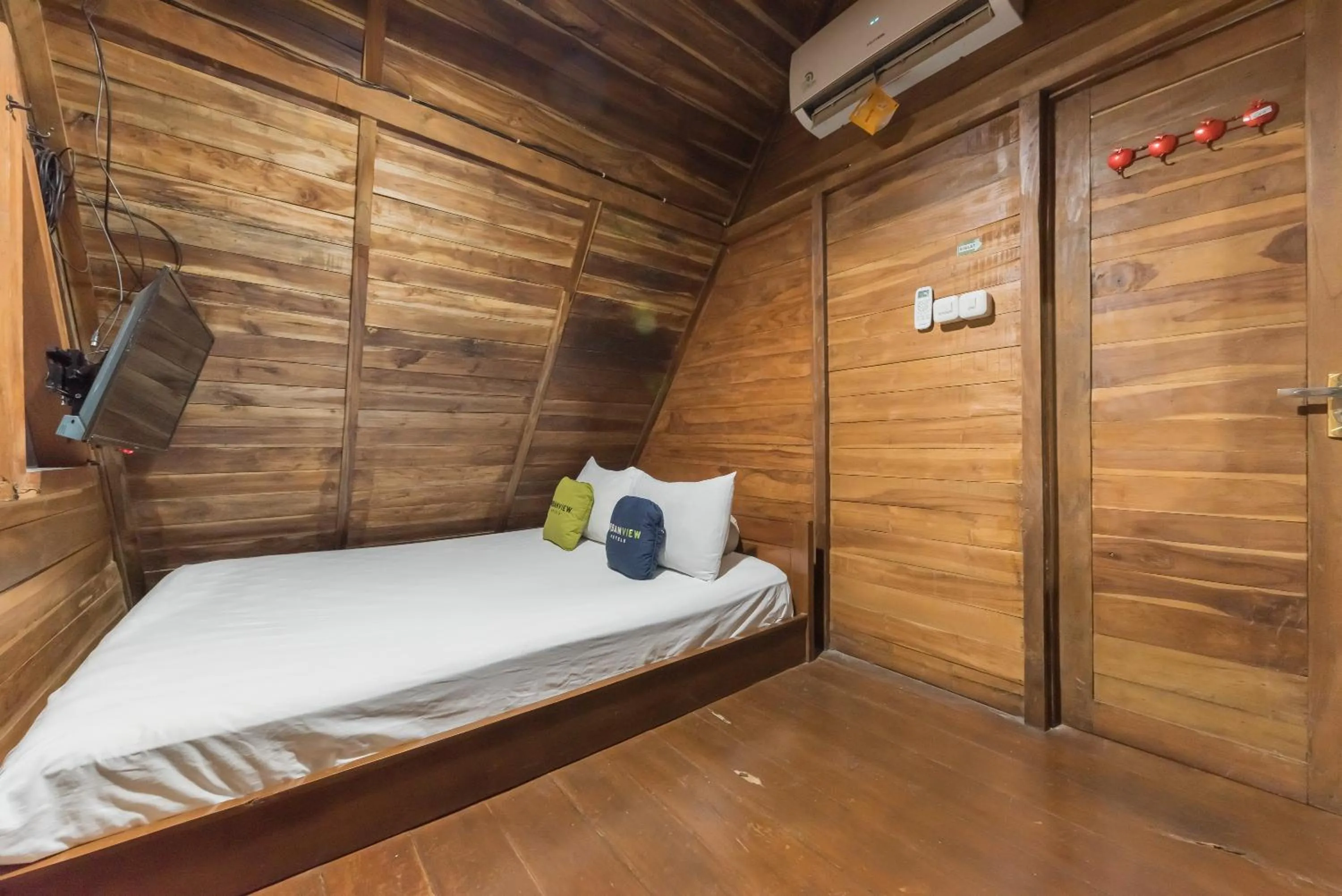 Bed in Urbanview Hotel Cianjur City Park by RedDoorz