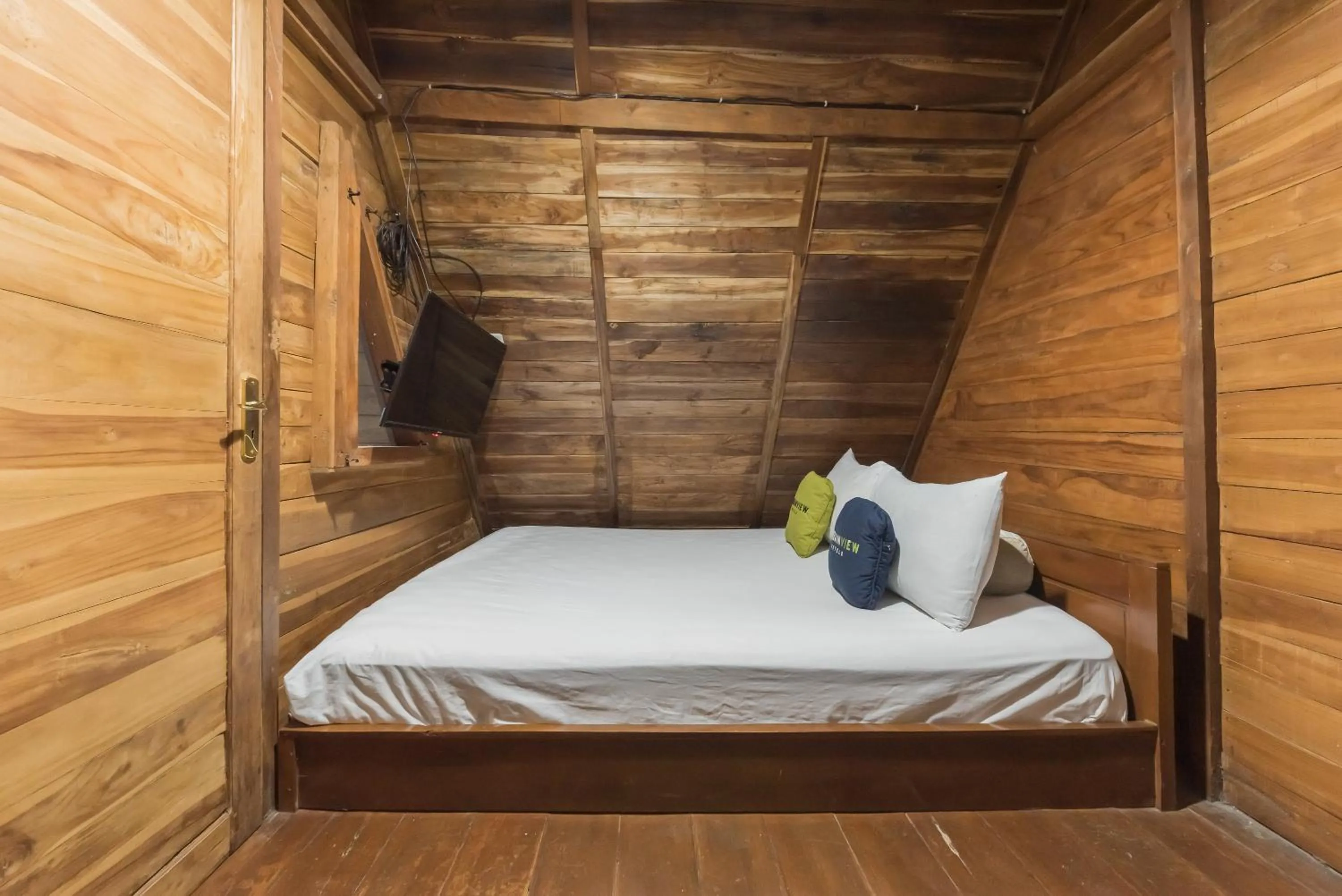 Bed in Urbanview Hotel Cianjur City Park by RedDoorz