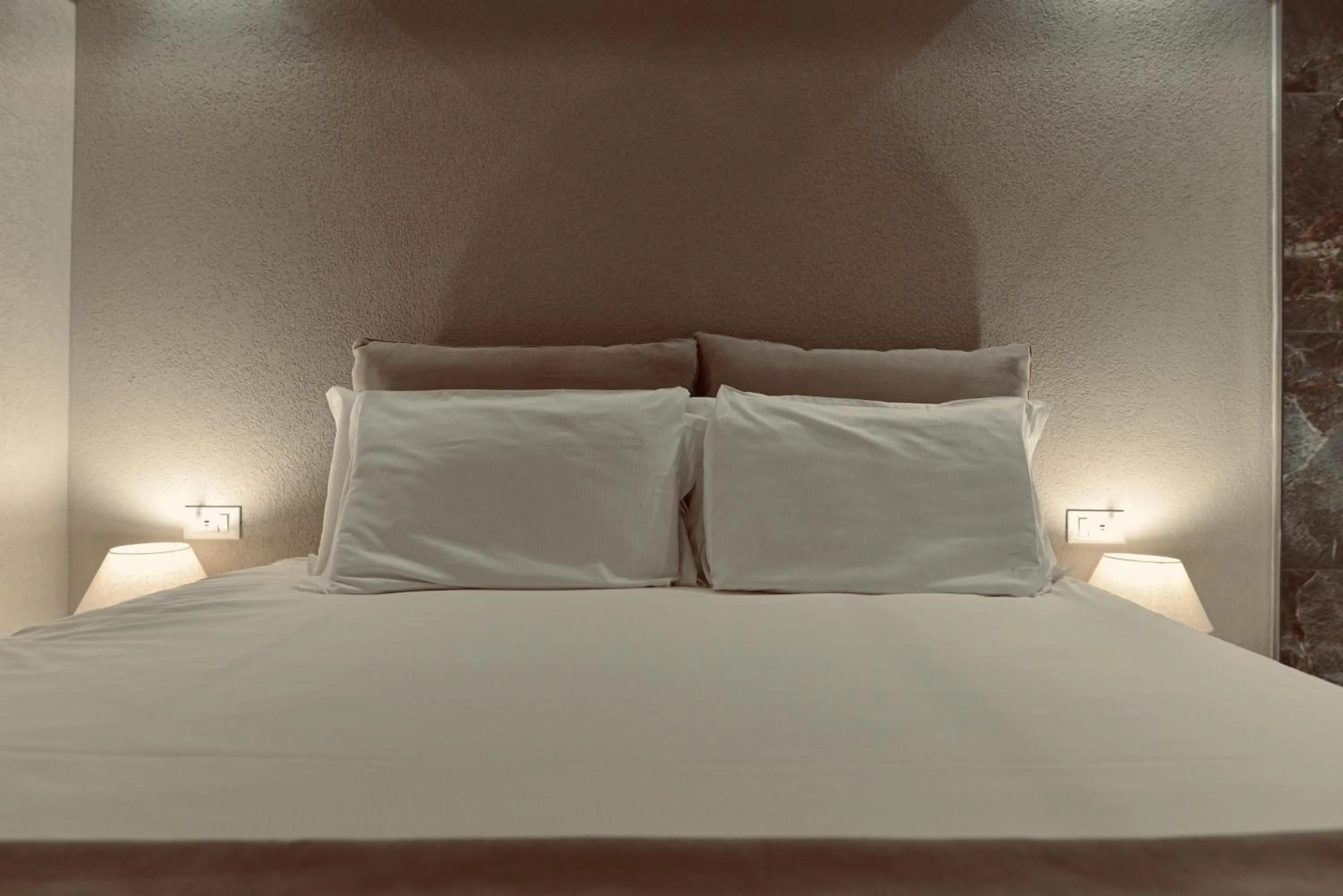 Bed in Palermo Inn Boutique Hotel