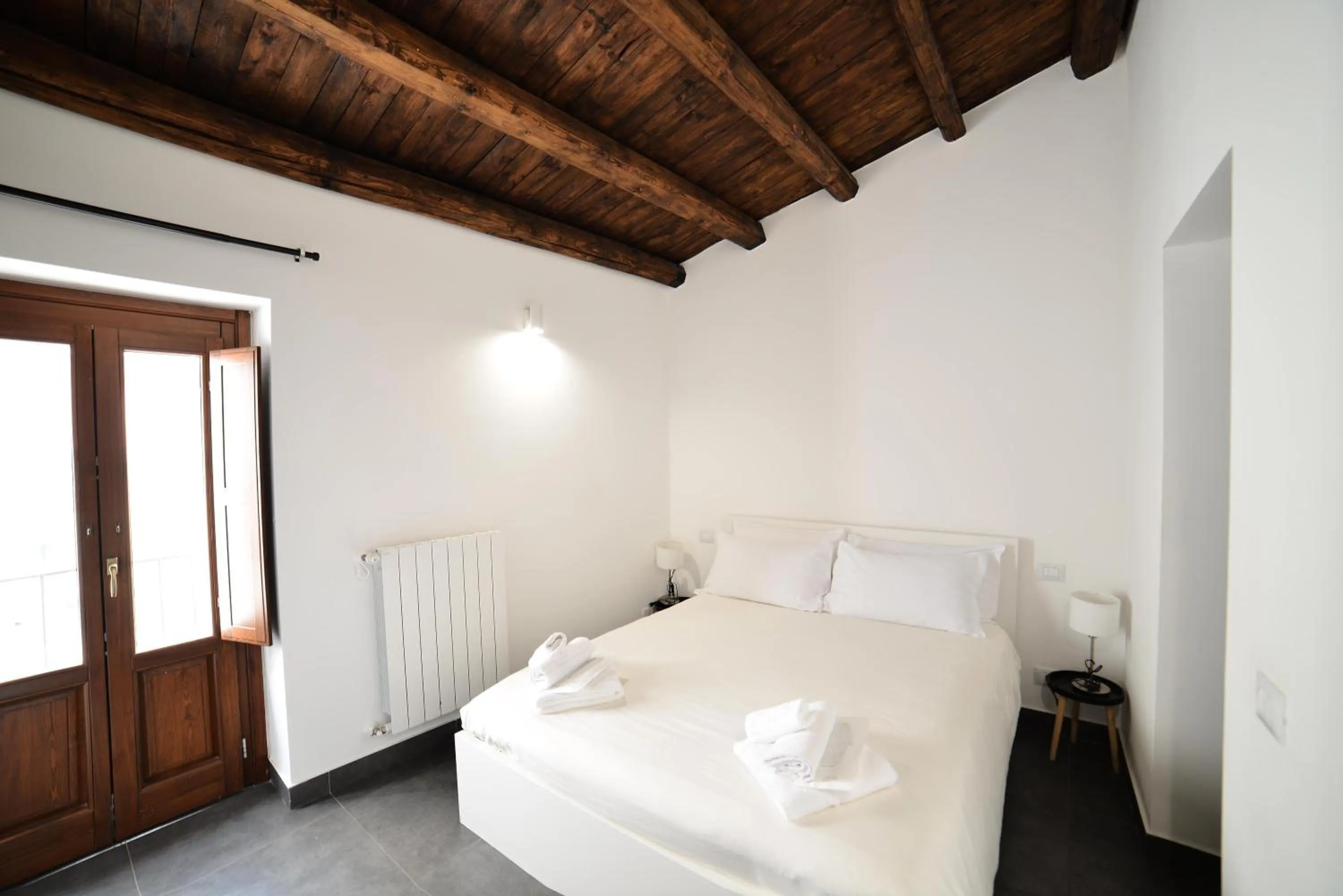 Bed in Palermo Inn Boutique Hotel