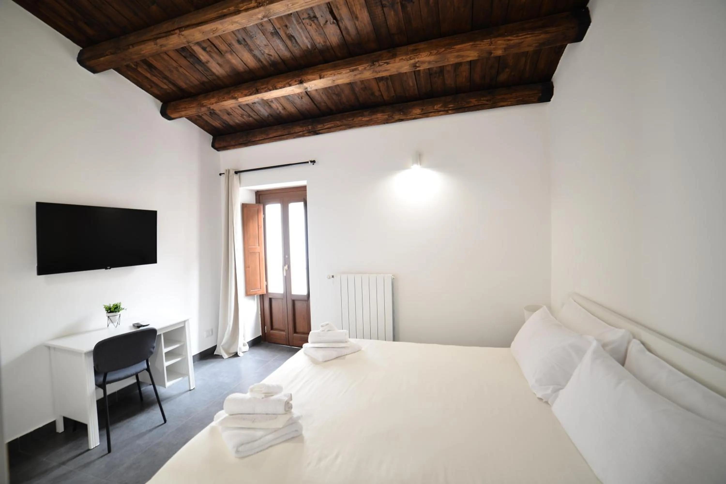 Bed in Palermo Inn Boutique Hotel