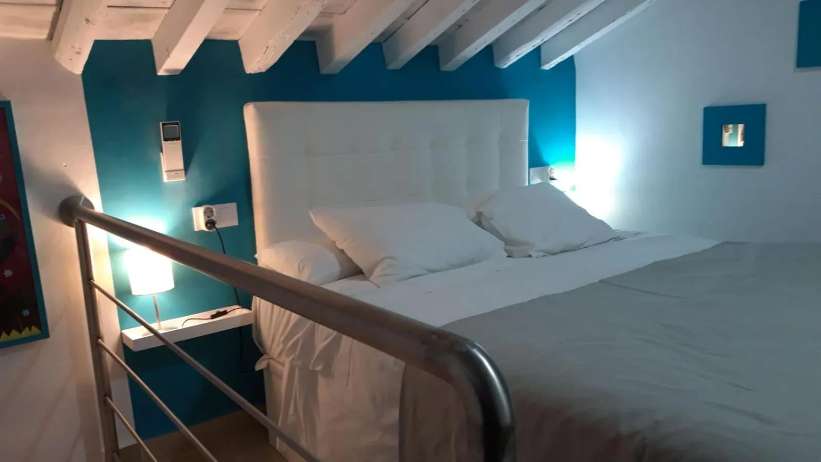 Bed in Apartamentos Marques De La Merced