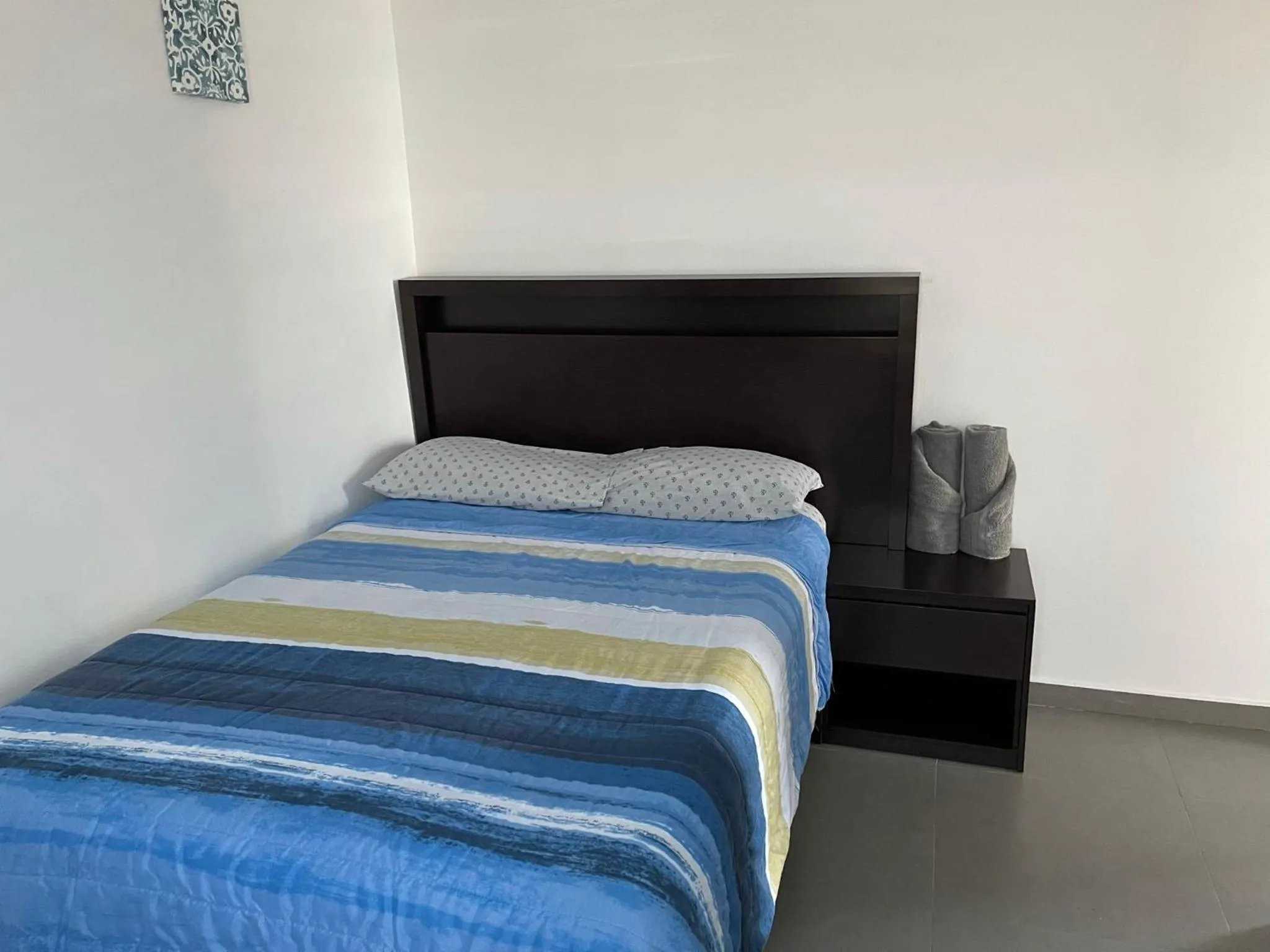 Bedroom, Bed in Departamento en Edificio El Semillero