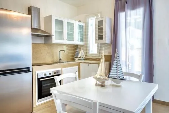 Kitchen or kitchenette in Villa Arya - Piscina privata By Cala Salento