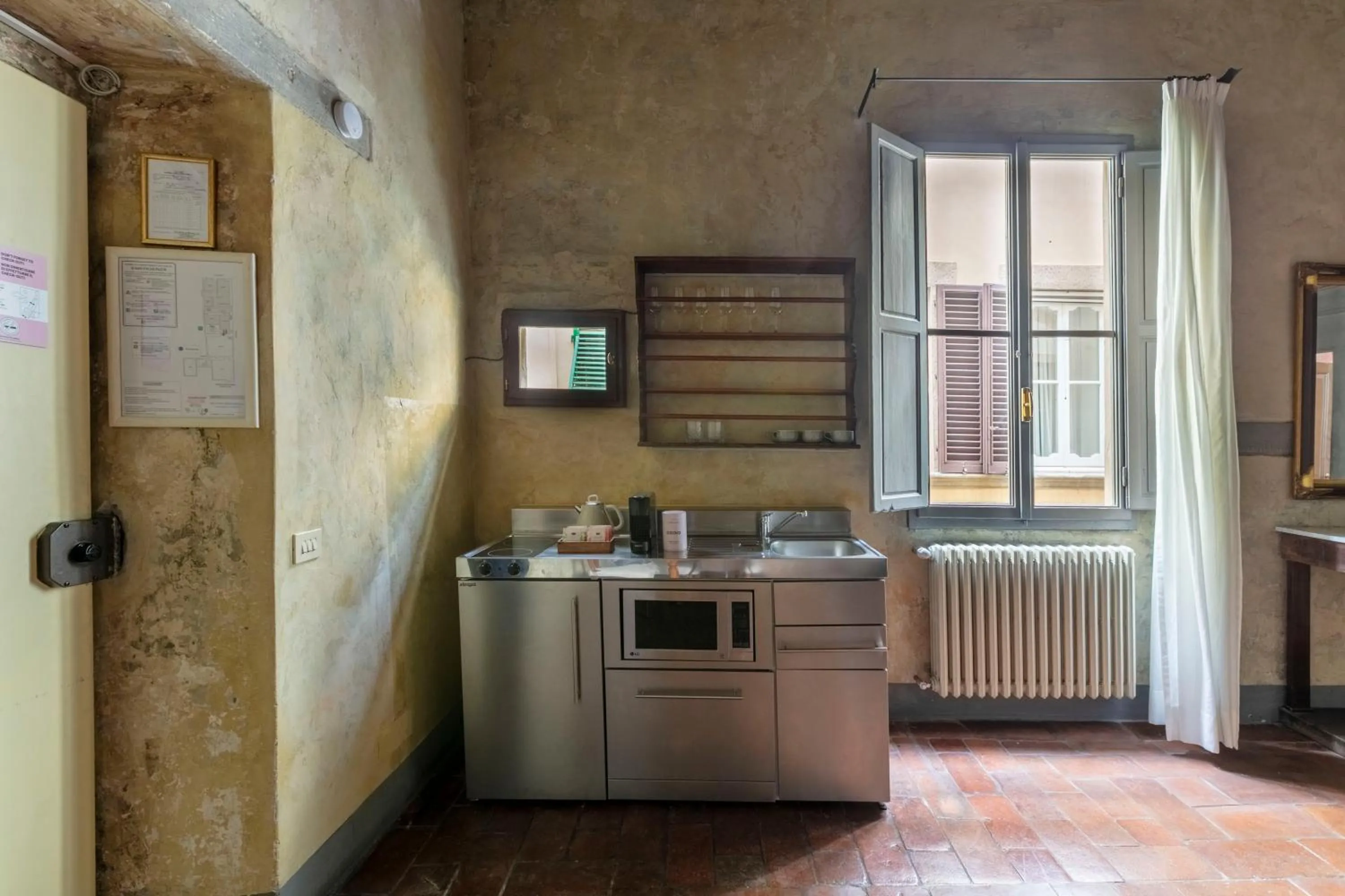 Kitchen or kitchenette in Numa Florence Palazzo Belfiore