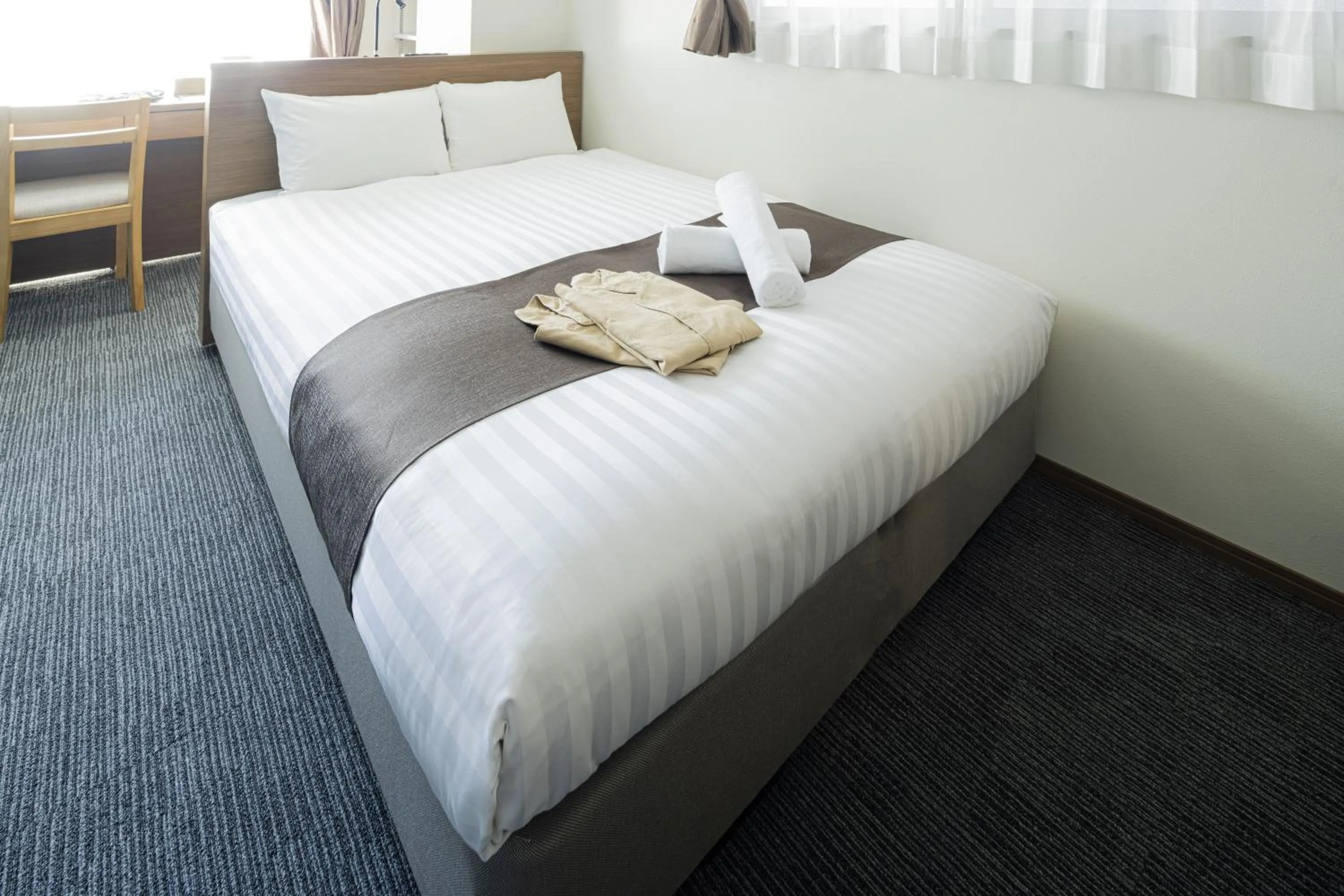 Photo of the whole room, Bed in Coruscant Hotel NagasakiekiⅢ