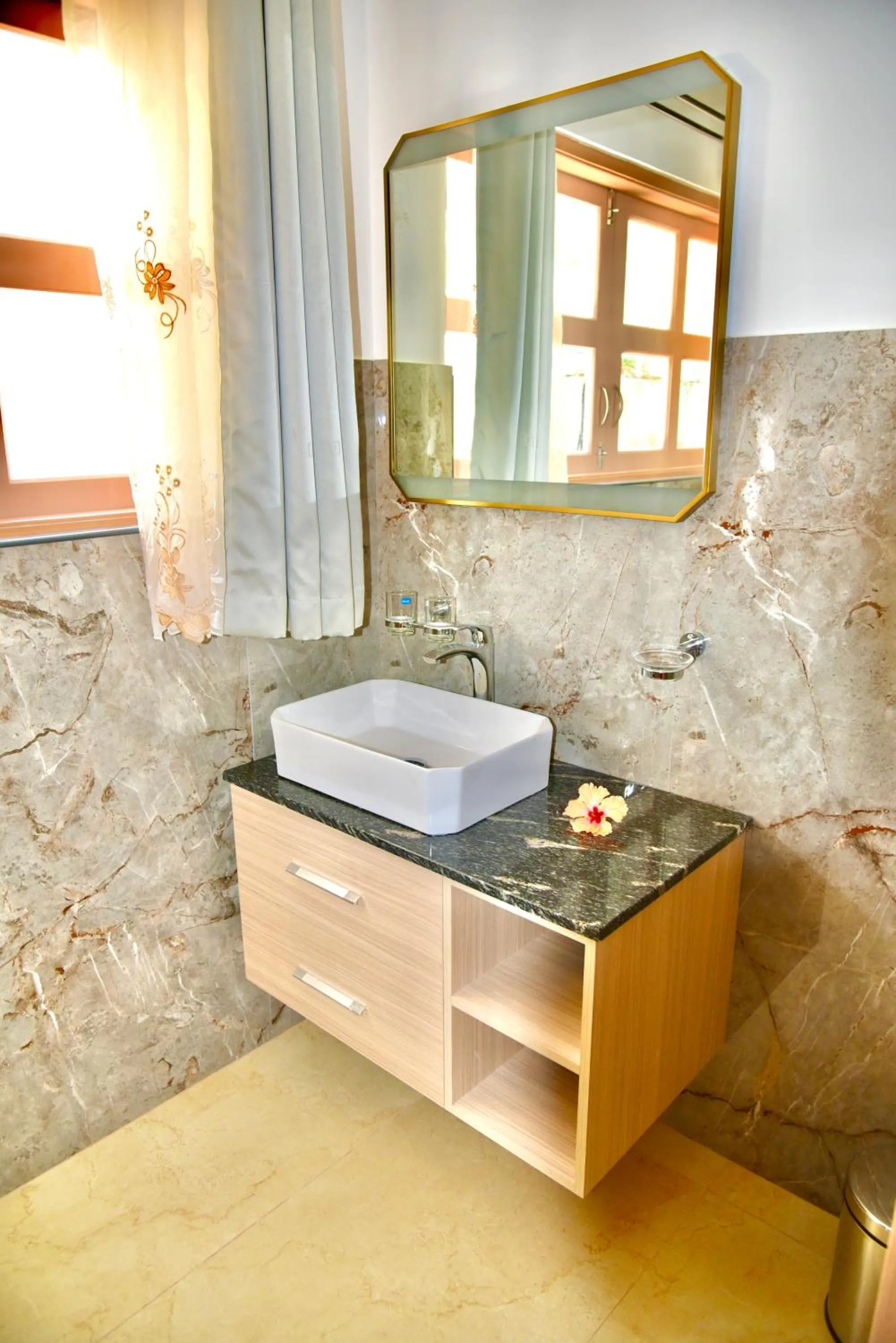 Bathroom in SEA SPLASH SELF CATERING And La Petite Maison