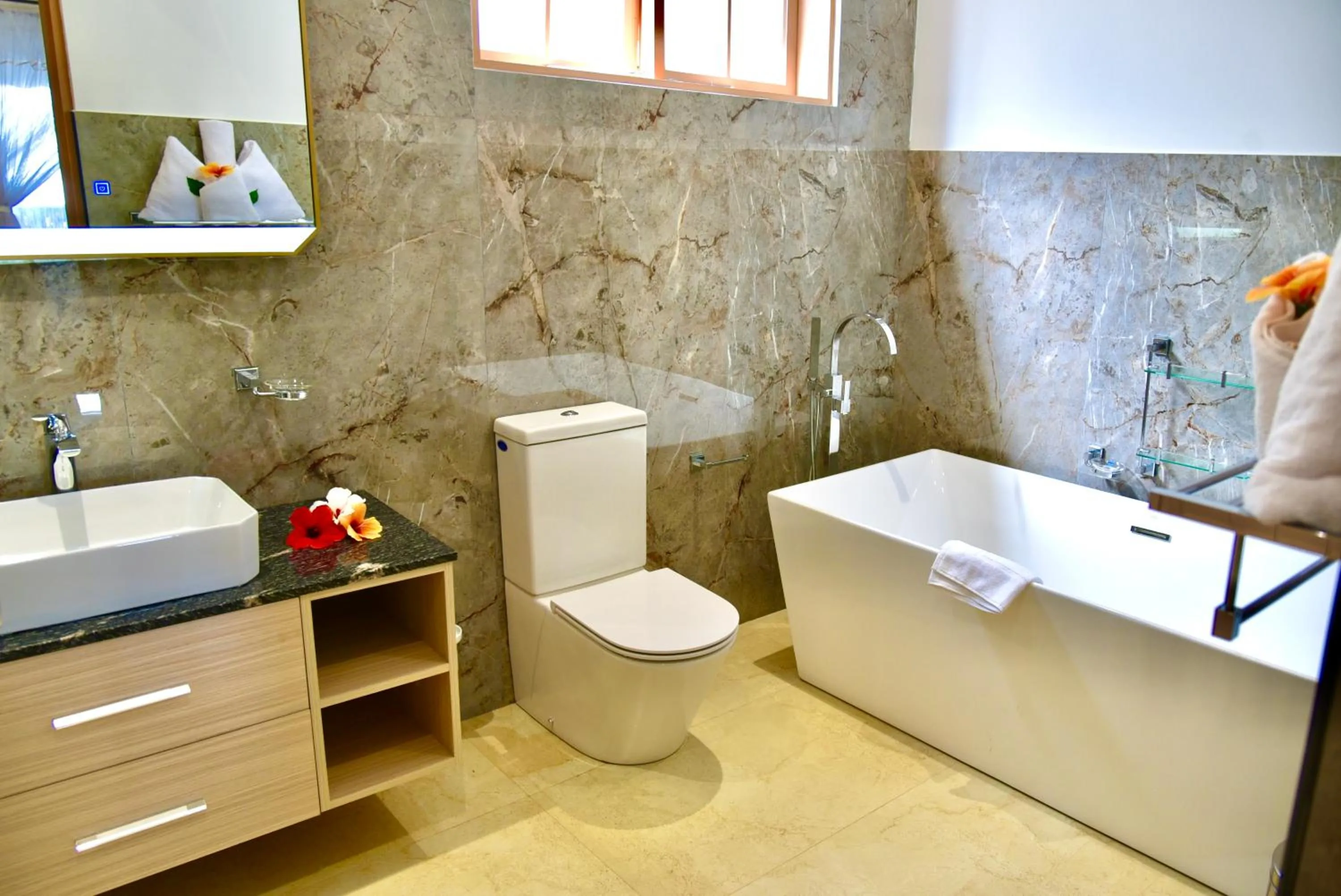 Bathroom in SEA SPLASH SELF CATERING And La Petite Maison