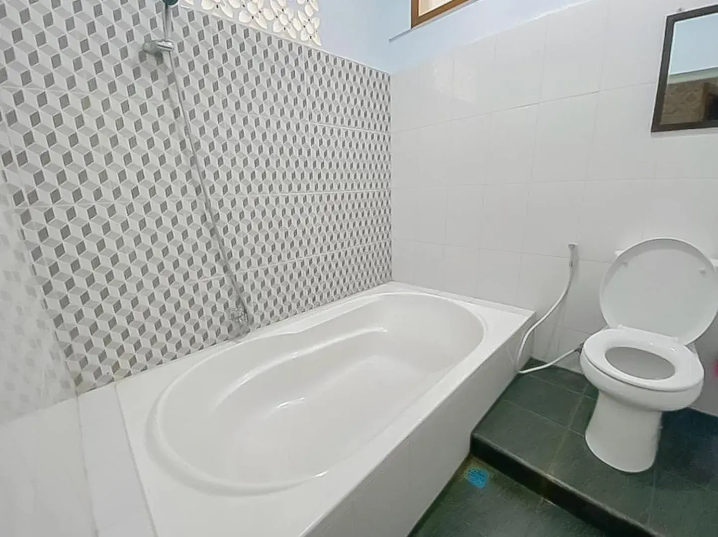 Bathroom in Ultima Syariah Cipanas Garut Mitra RedDoorz Bathroom in Ultima Syariah Cipanas Garut Mitra RedDoorz