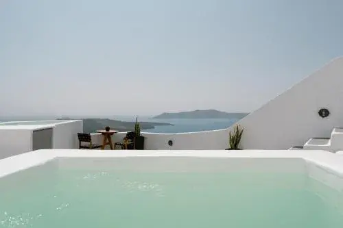 Family Room with Caldera View and Outdoor Hot Tub in Anemos Fira Caldera View Family Room with Caldera View and Outdoor Hot Tub in Anemos Fira Caldera View