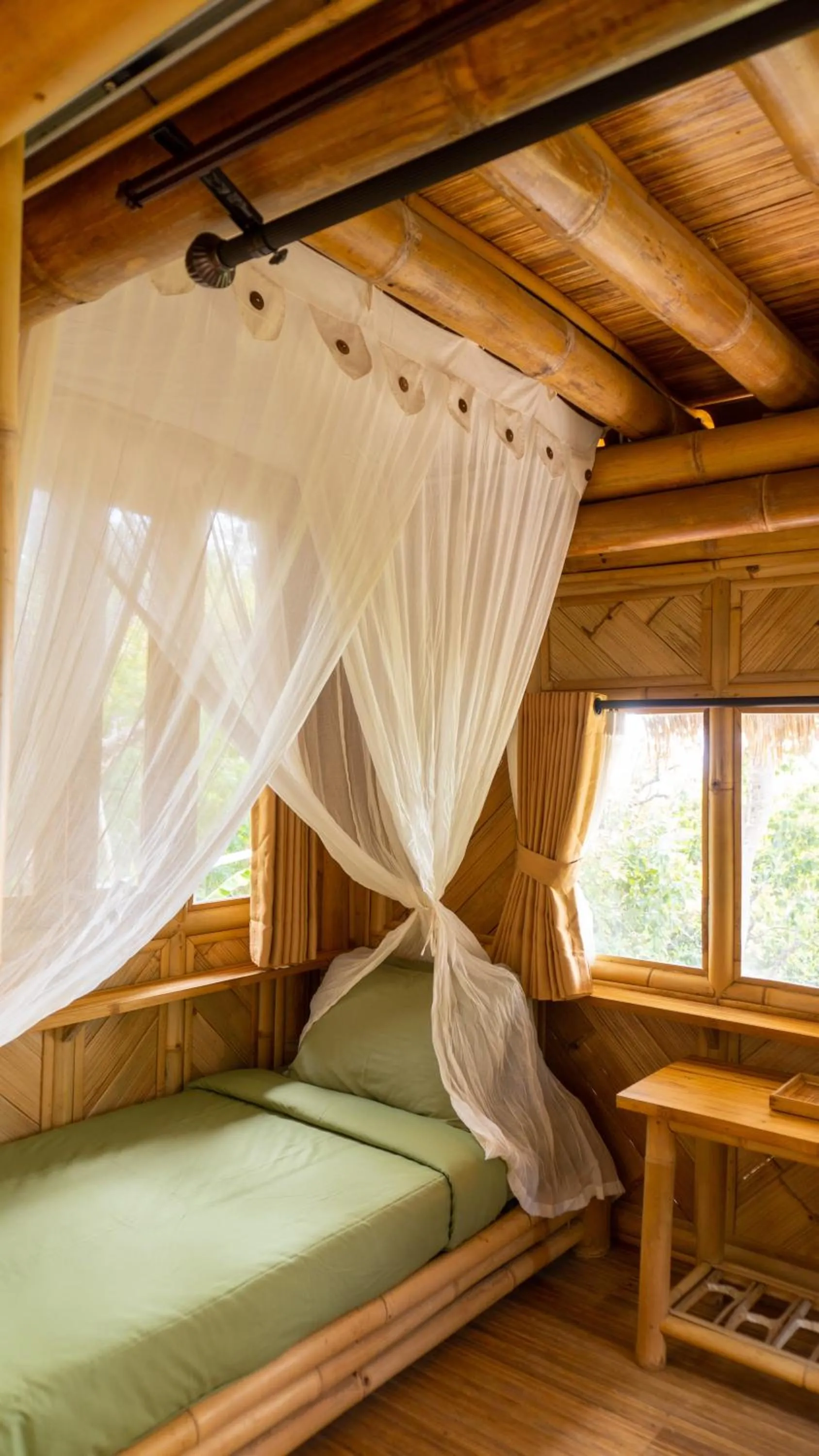 Bed in Elang Hillside Bamboo Villas