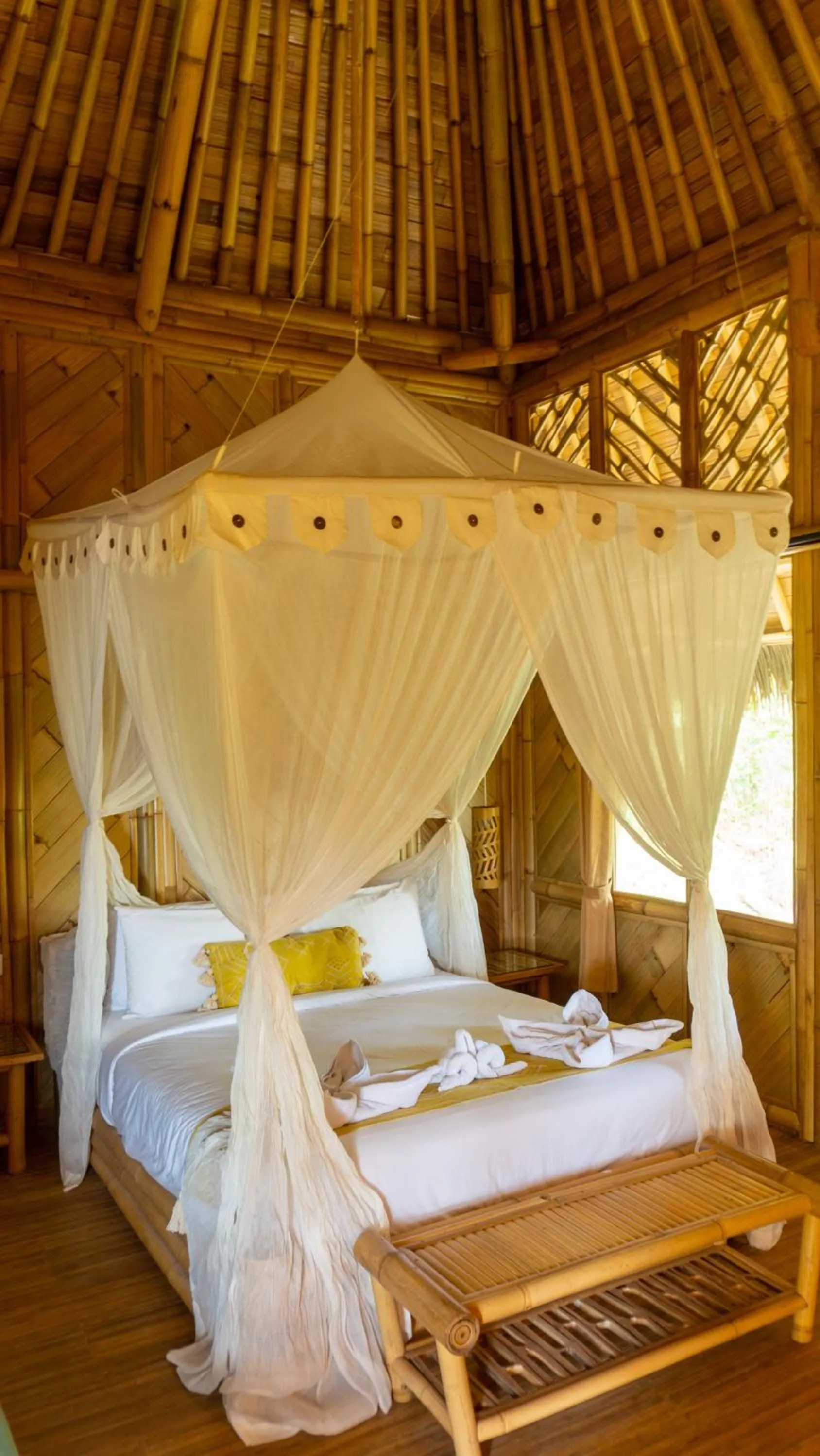 Bed in Elang Hillside Bamboo Villas