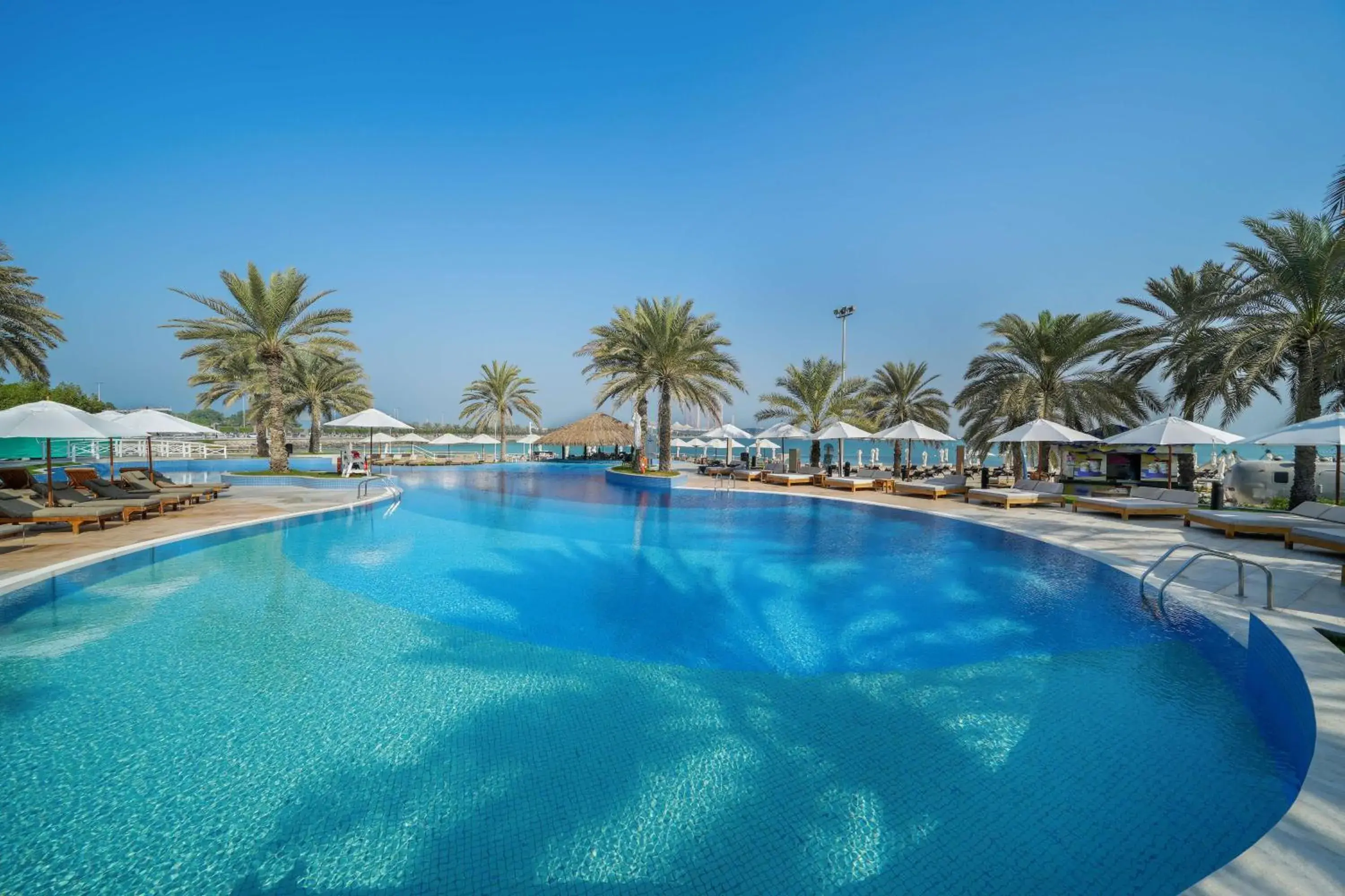 Pool view in Radisson Blu Hotel & Resort, Abu Dhabi Corniche Pool view in Radisson Blu Hotel & Resort, Abu Dhabi Corniche