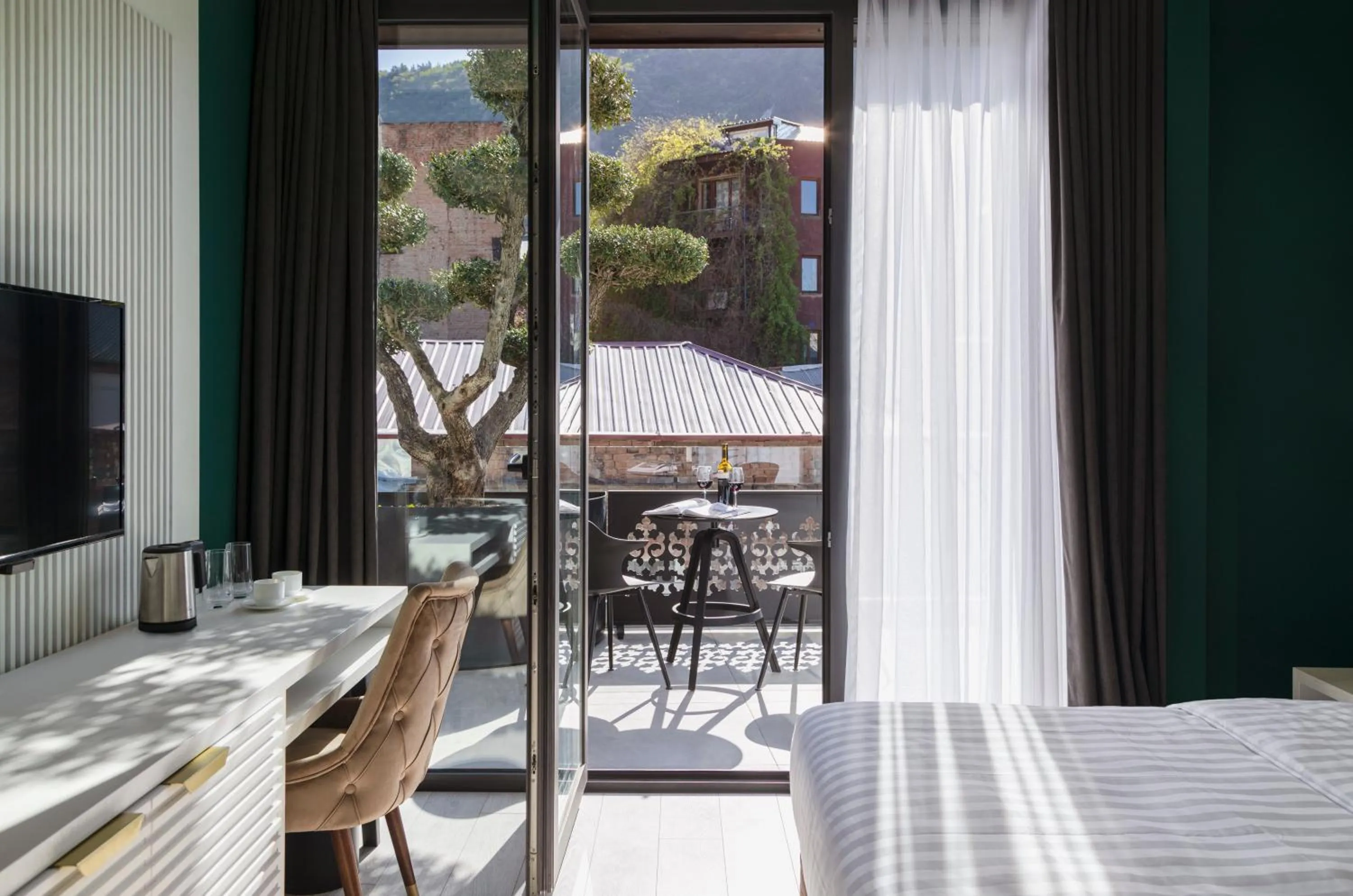 Patio, Bed in Original Boutique Aparthotel