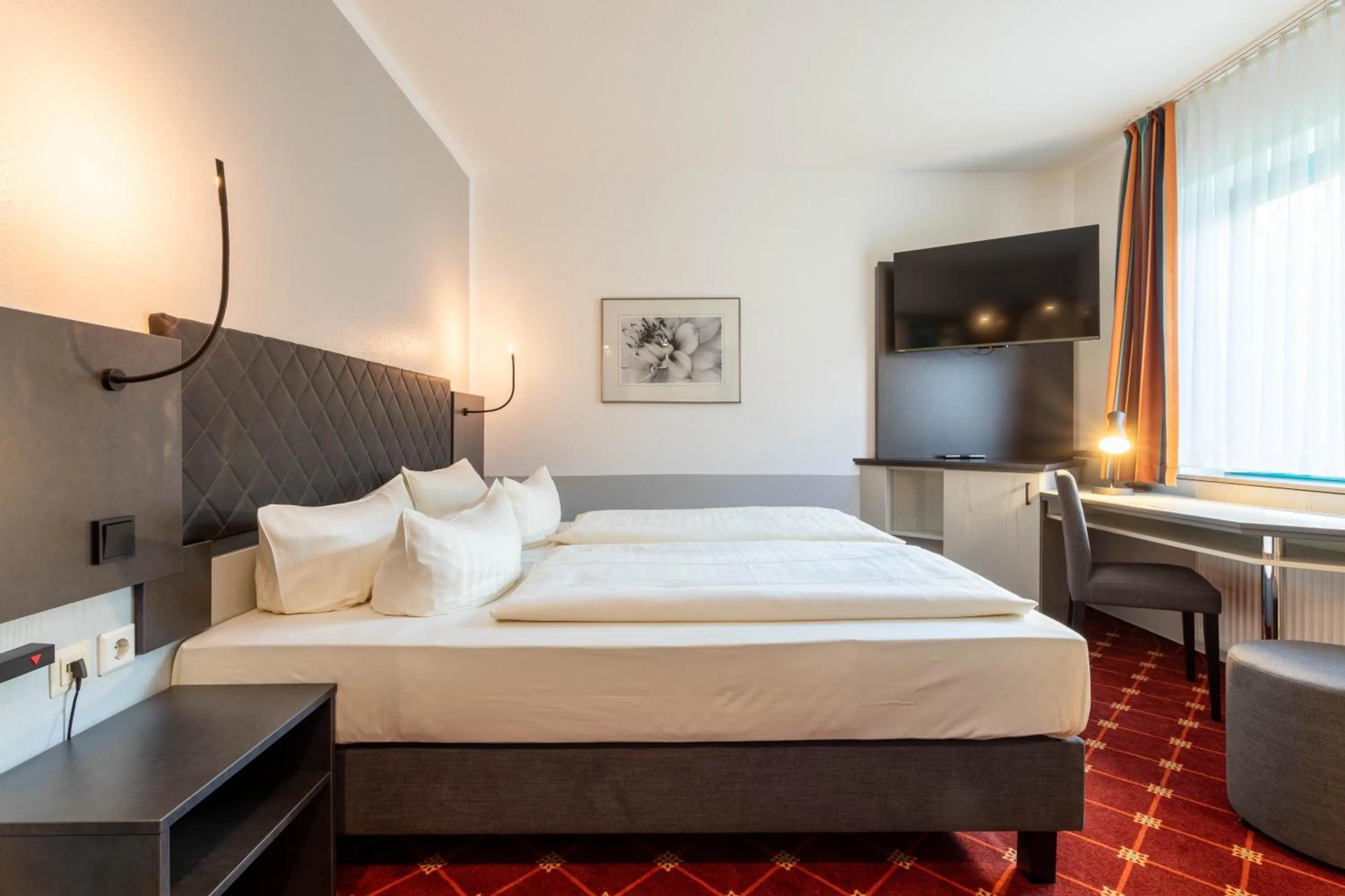 Photo of the whole room, Bed in Montana Trend Hotel Lehrte