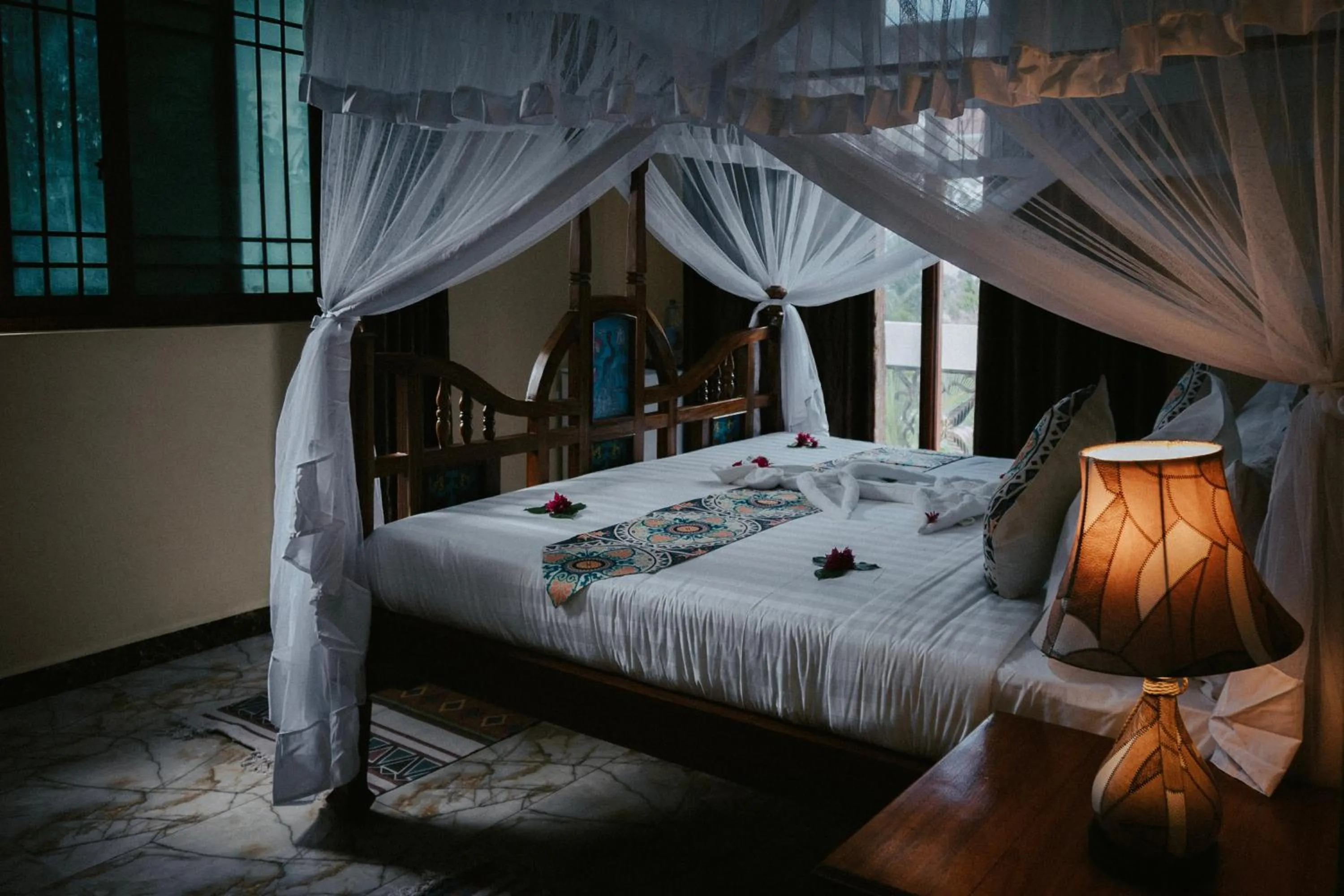 Bed in Sunny Palms Beach Bungalows