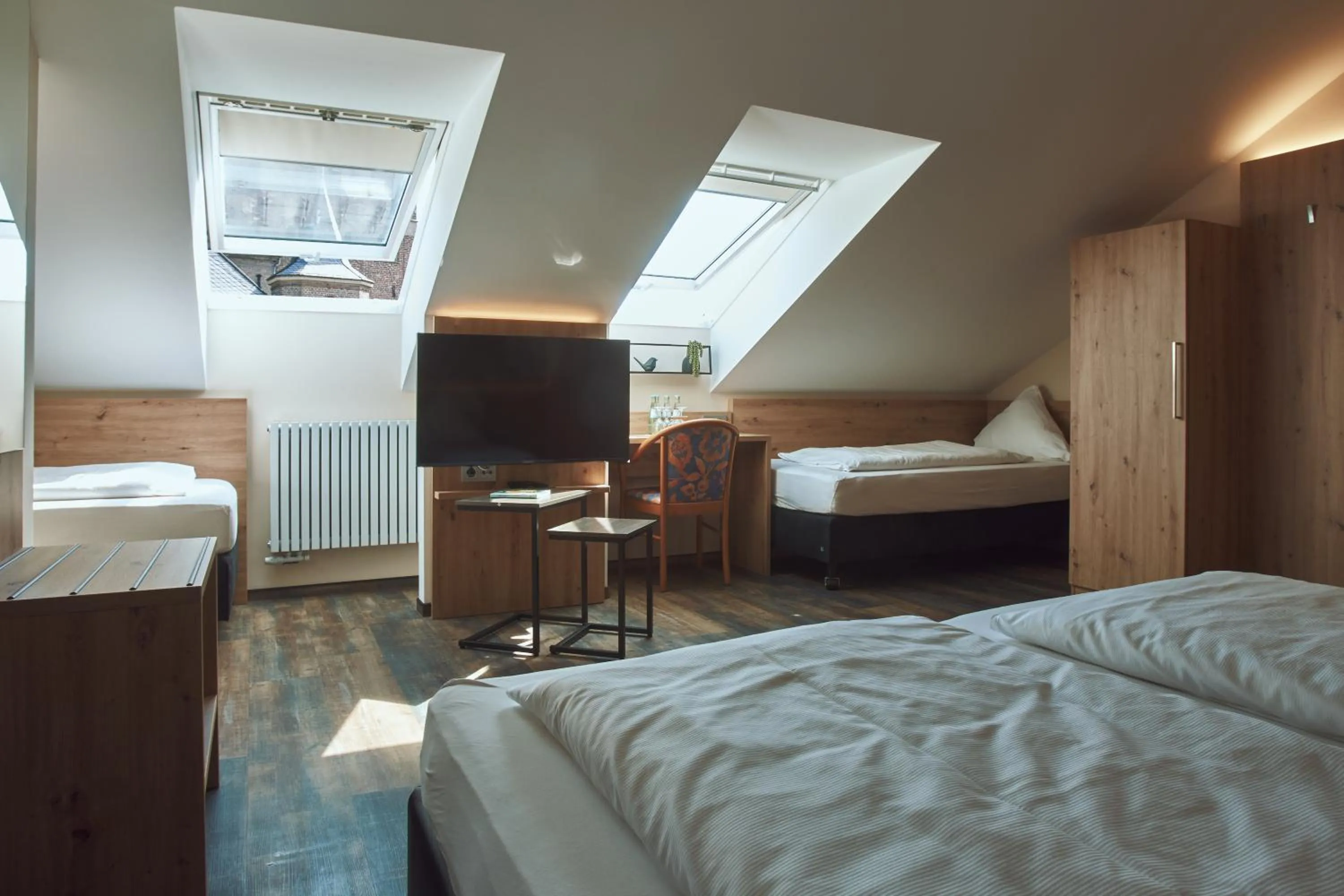 Communal lounge/ TV room, Bed in Hotel Restaurant Doppeladler